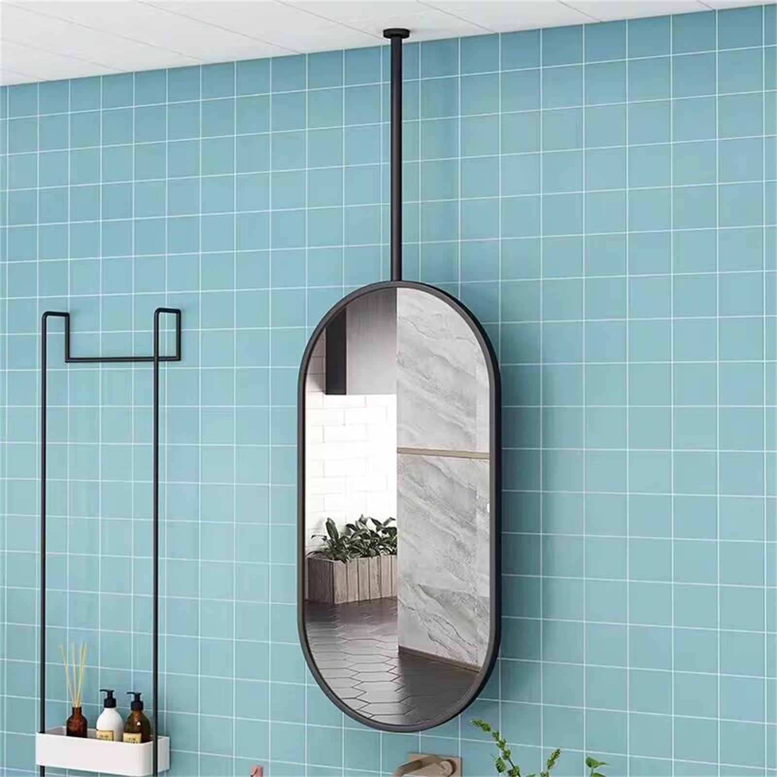 Miroir mural ovale cadre métal pour illuminer votre salon et votre entrée