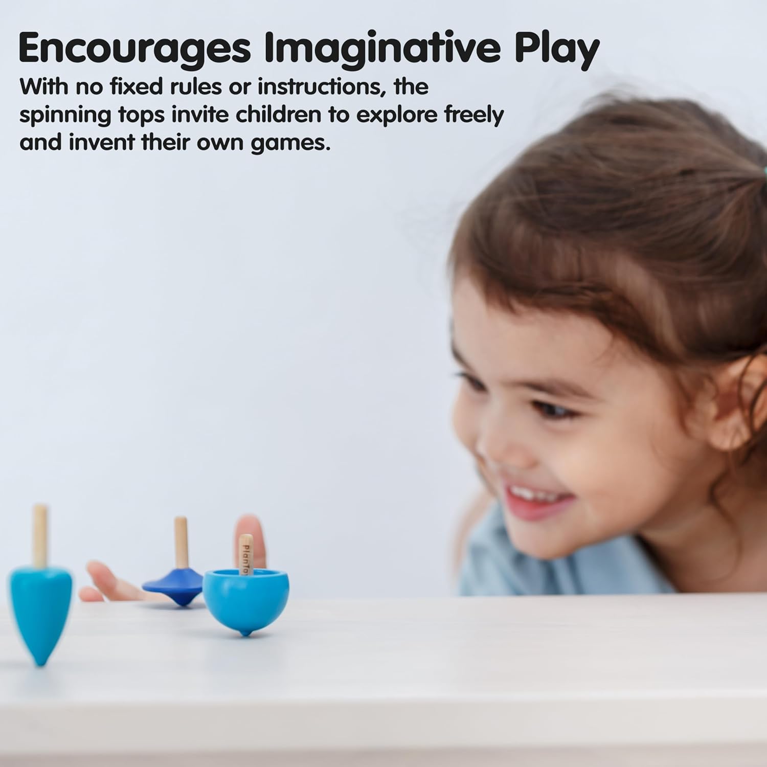 PlanToys® Mini Wooden Spinning Tops Set | 4 Colorful Eco-Friendly Montessori Toys for Toddlers | Travel Toys for Kids | Sensory Fidget Toys for Focus & Coordination 4 Small Spinning Top image 5