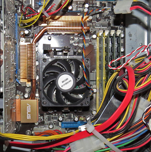 The heatsink fins are too low to fit our M2N32-SLI motherboard, no problem as a Zalman CNPS7X fitted and it's a better cooler