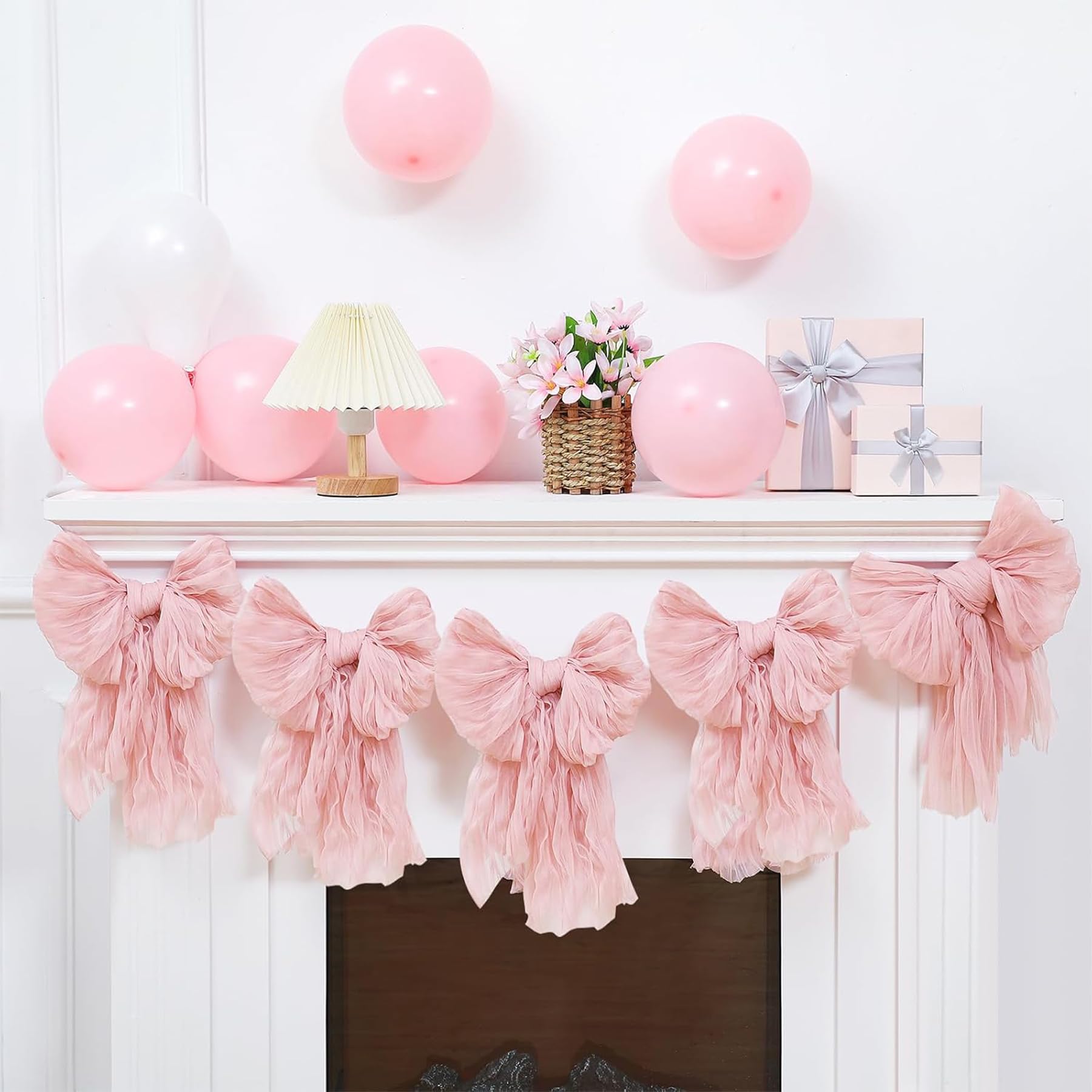 Guirnalda de lazo: evita adornos caídos en decoraciones de baby shower rosa