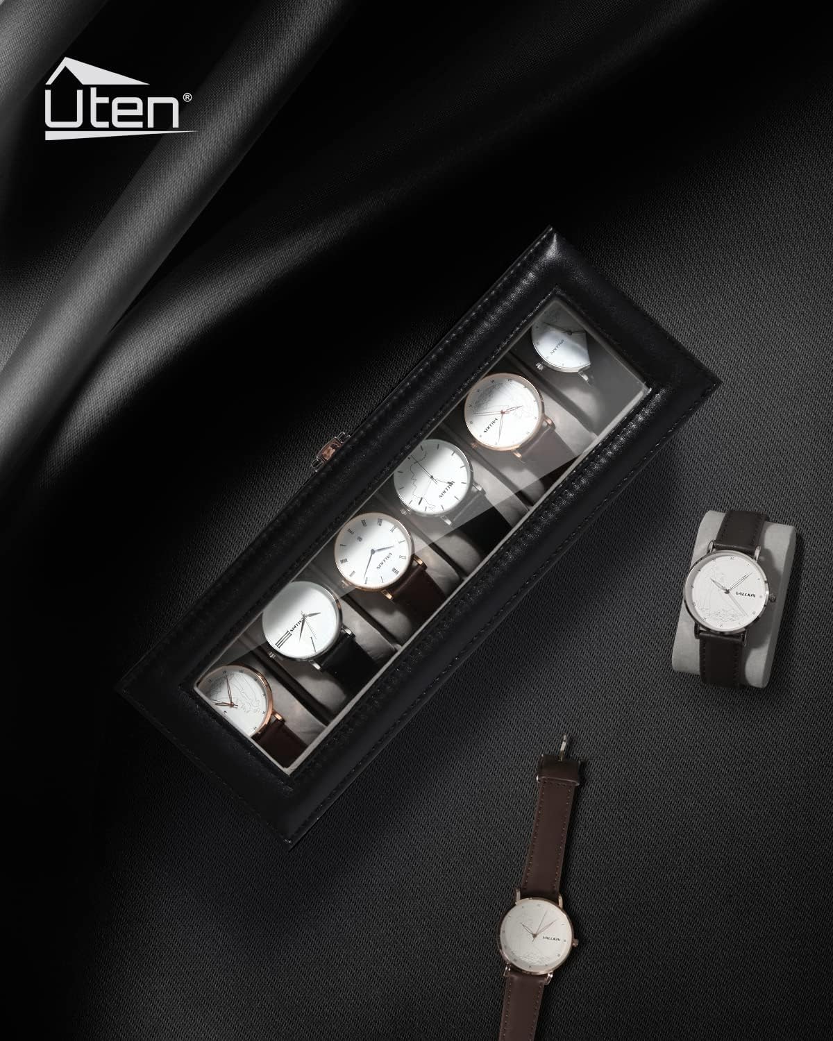 ഒരു ഓവർഹെഡ് view of the Uten watch box, highlighting its compact and organized layout.