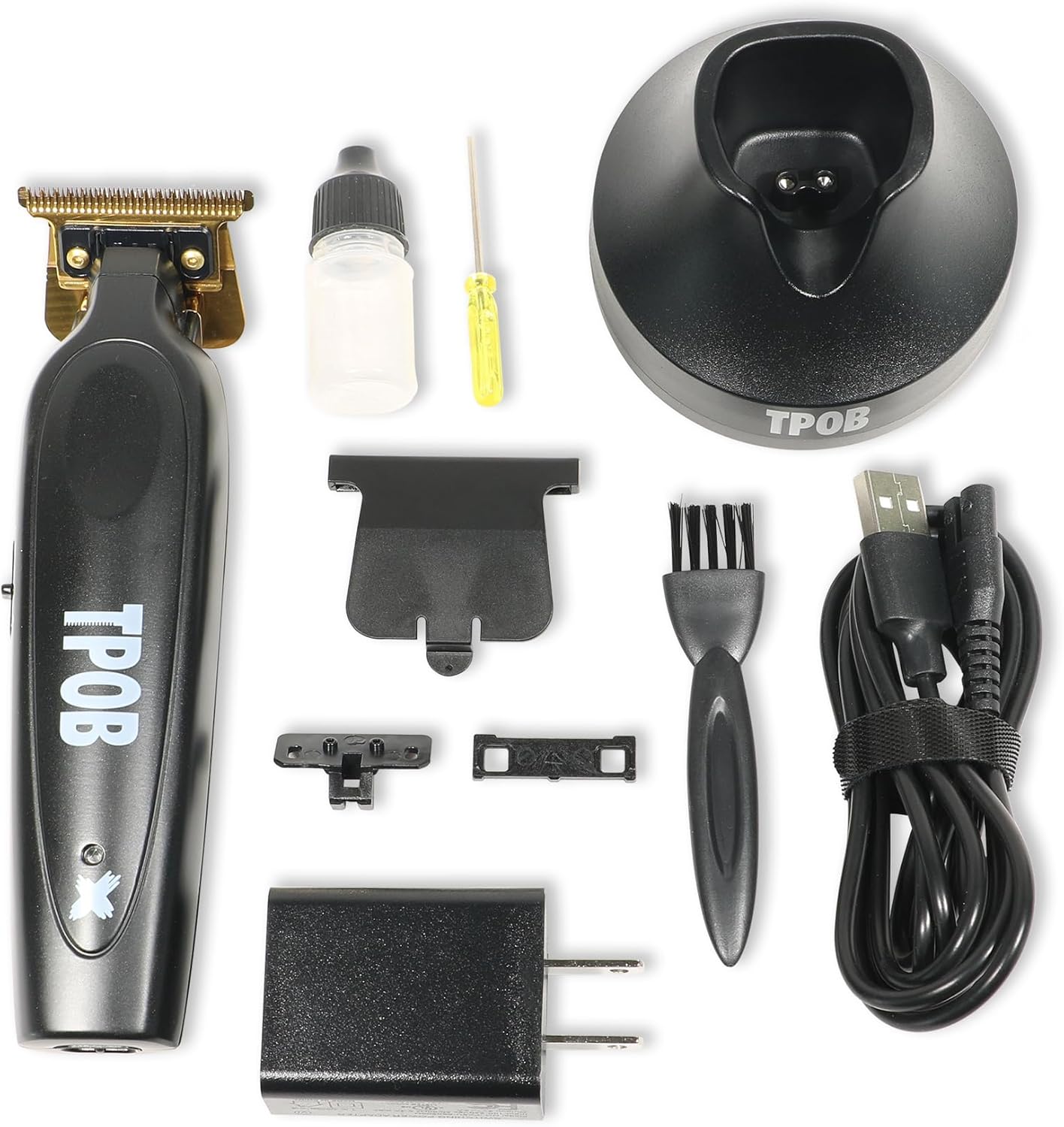 All components of the TPOB Black X Trimmer package laid out on a white background.