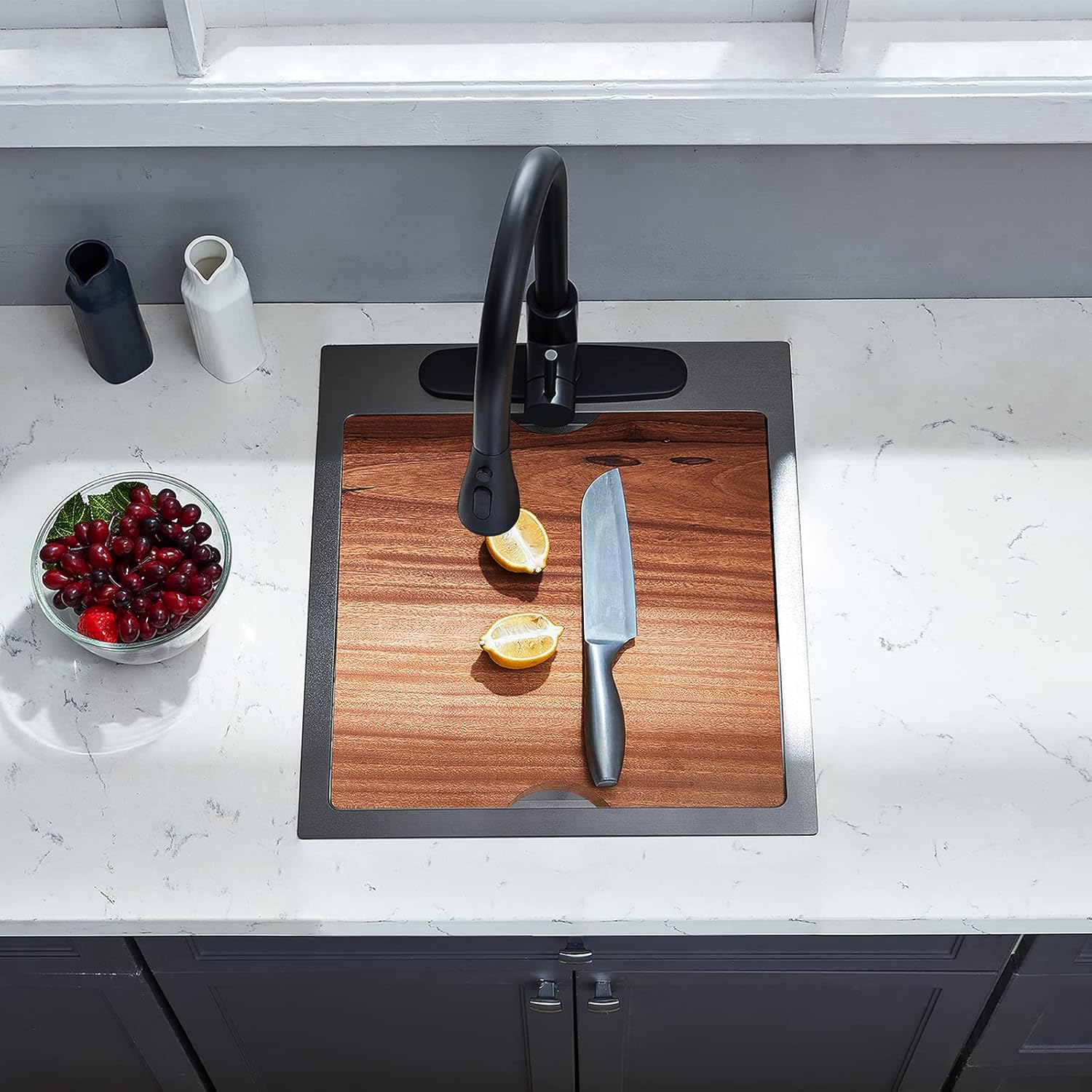 EcoChannels 17x19 Inch Drop-in Bar Sink with cutting board covering the basin