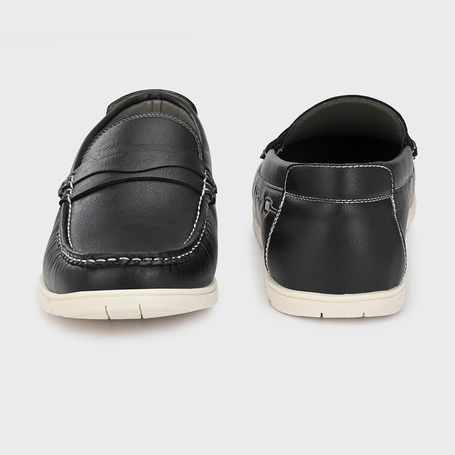 Davant i darrere view of a pair of Stanton Mens Loafers, showing the slip-on design.