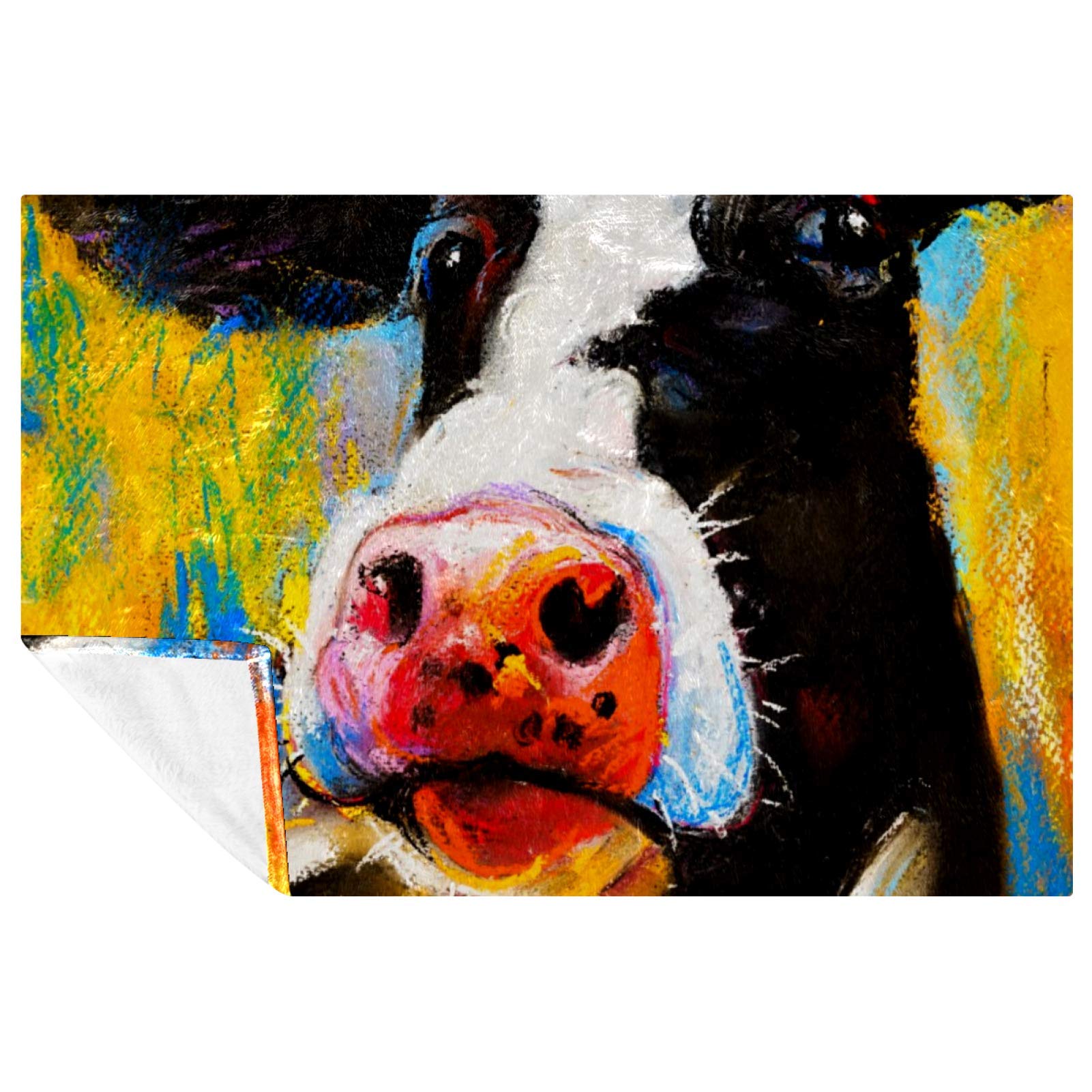 Couverture douce impression vache pastel pour des moments chauds en famille
