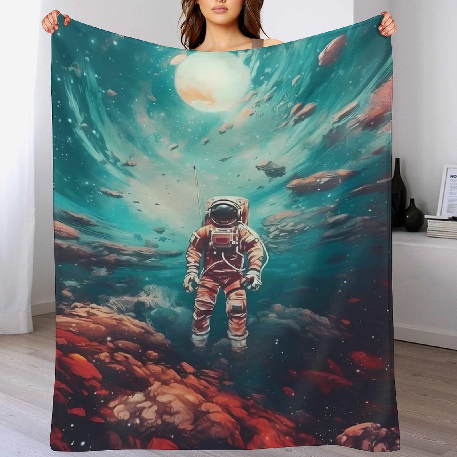 Couverture polaire astronaute pour des soirées canapé cocooning en famille