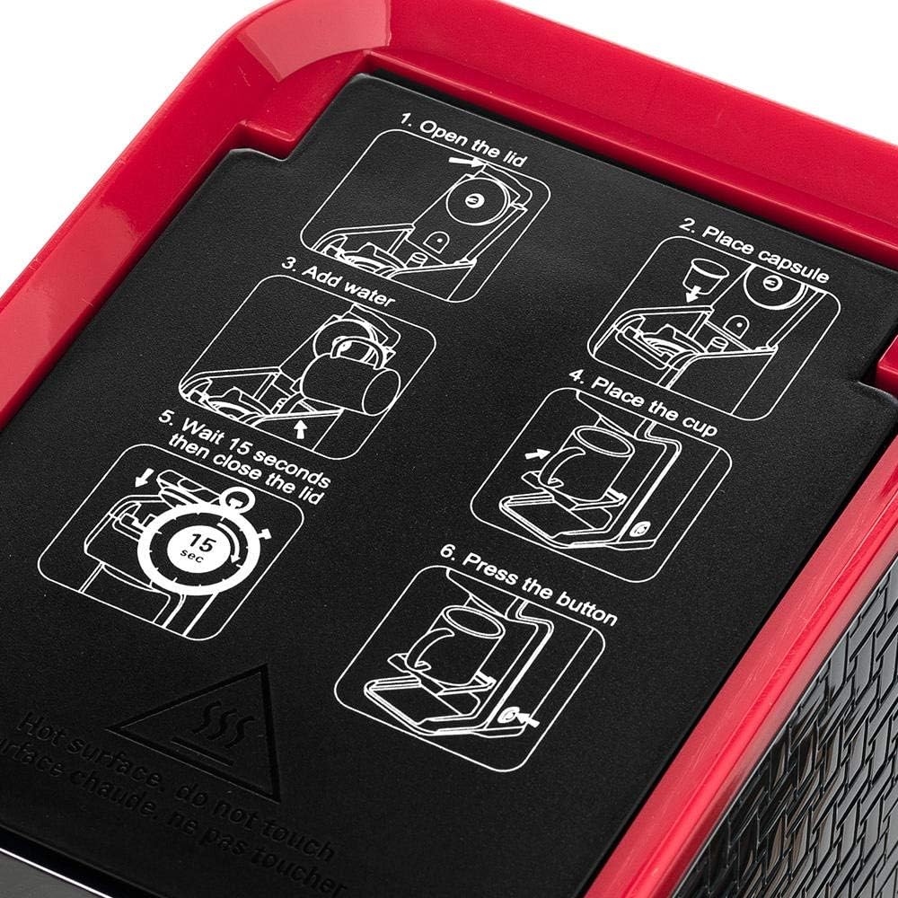 Close-up of the coffee maker's lid with illustrated steps for operation: Open lid, Place capsule, Add water, Place cup, Wait 15 seconds then close lid, Press button.