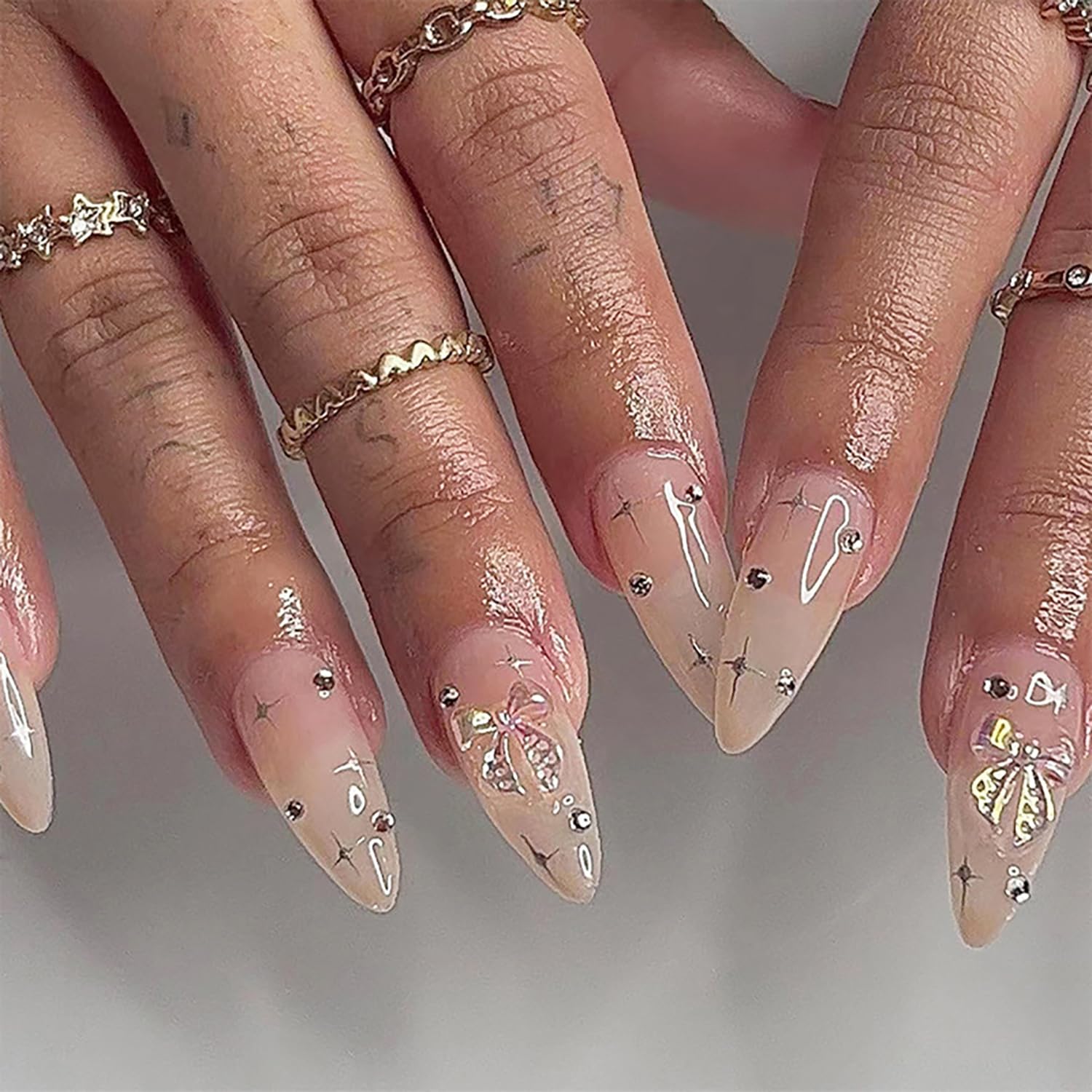French Tip Press on Nails Almond Medium Artifical Acrylic Fake Nails with Bow Tie Stars Design Almond Rhinestone False Nails Full Cover Reusable Nude