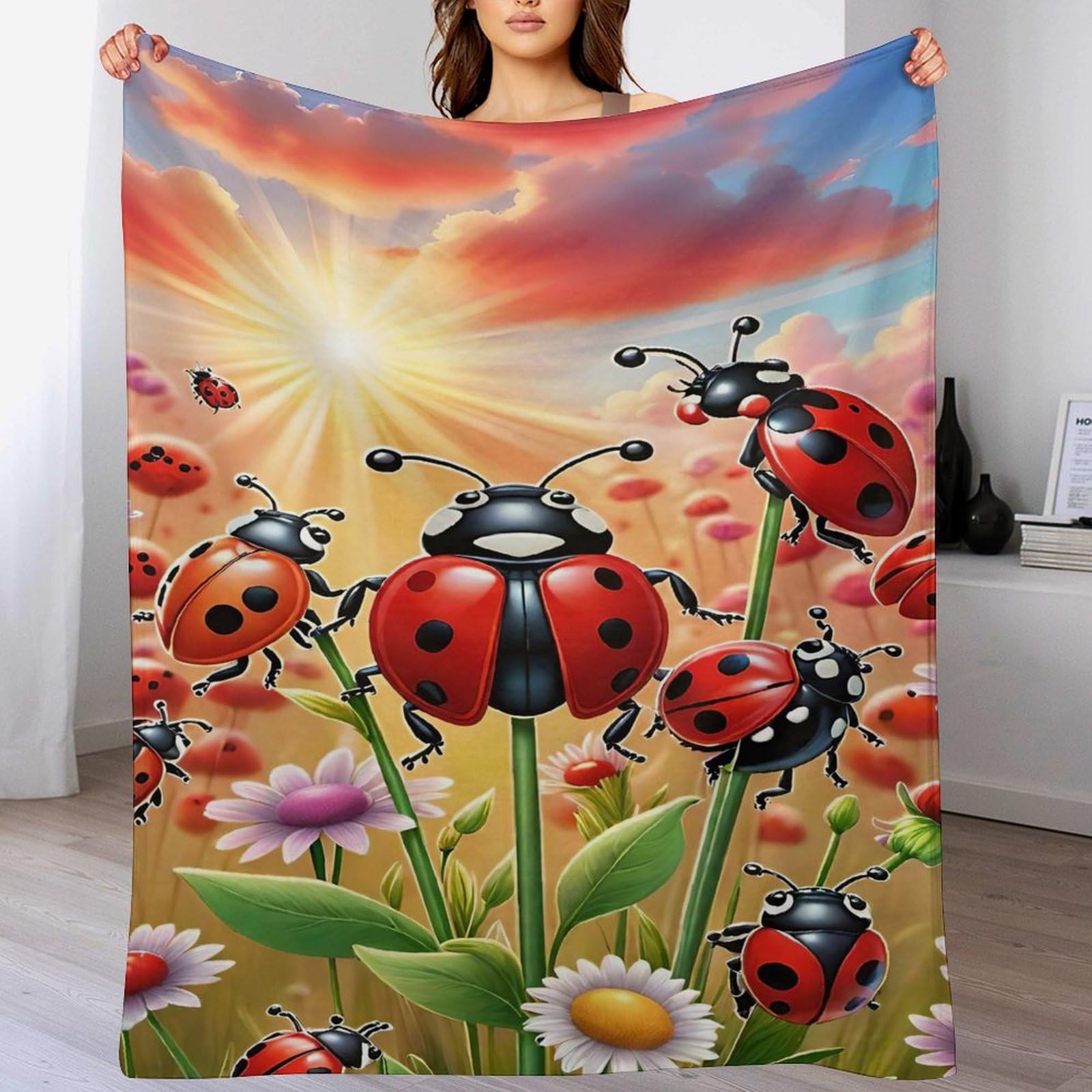 Couverture coccinelle polaire anti-froid pour ne plus frissonner sur votre lit ou sofa