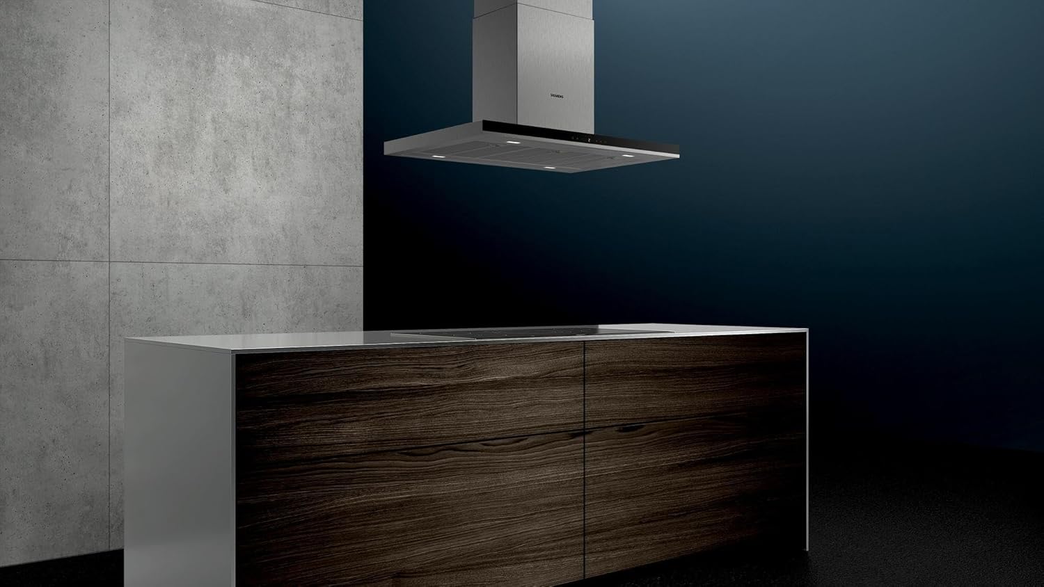 Siemens LF98BIP50 island hood installed above a kitchen island with a cooktop.