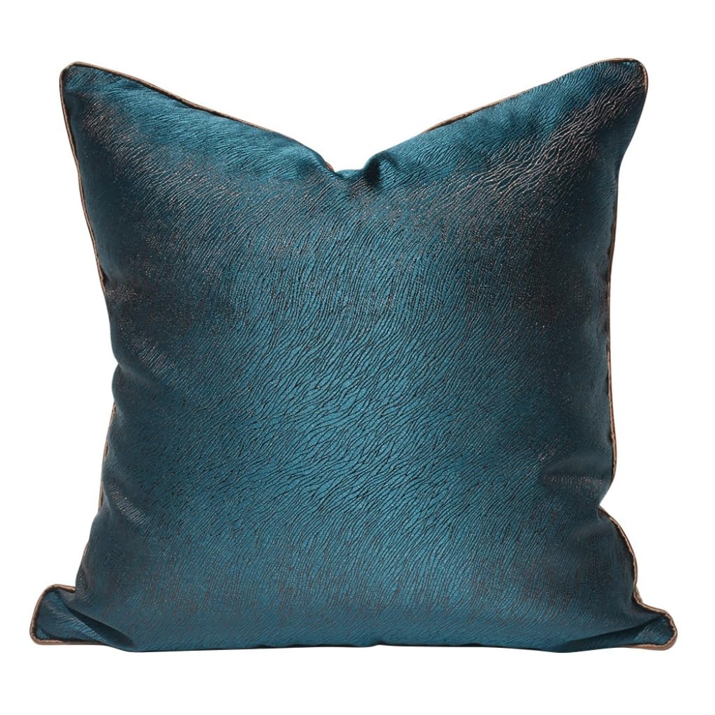 Coussin bleu paon tissé parfait pour sublimer la décoration de votre canapé