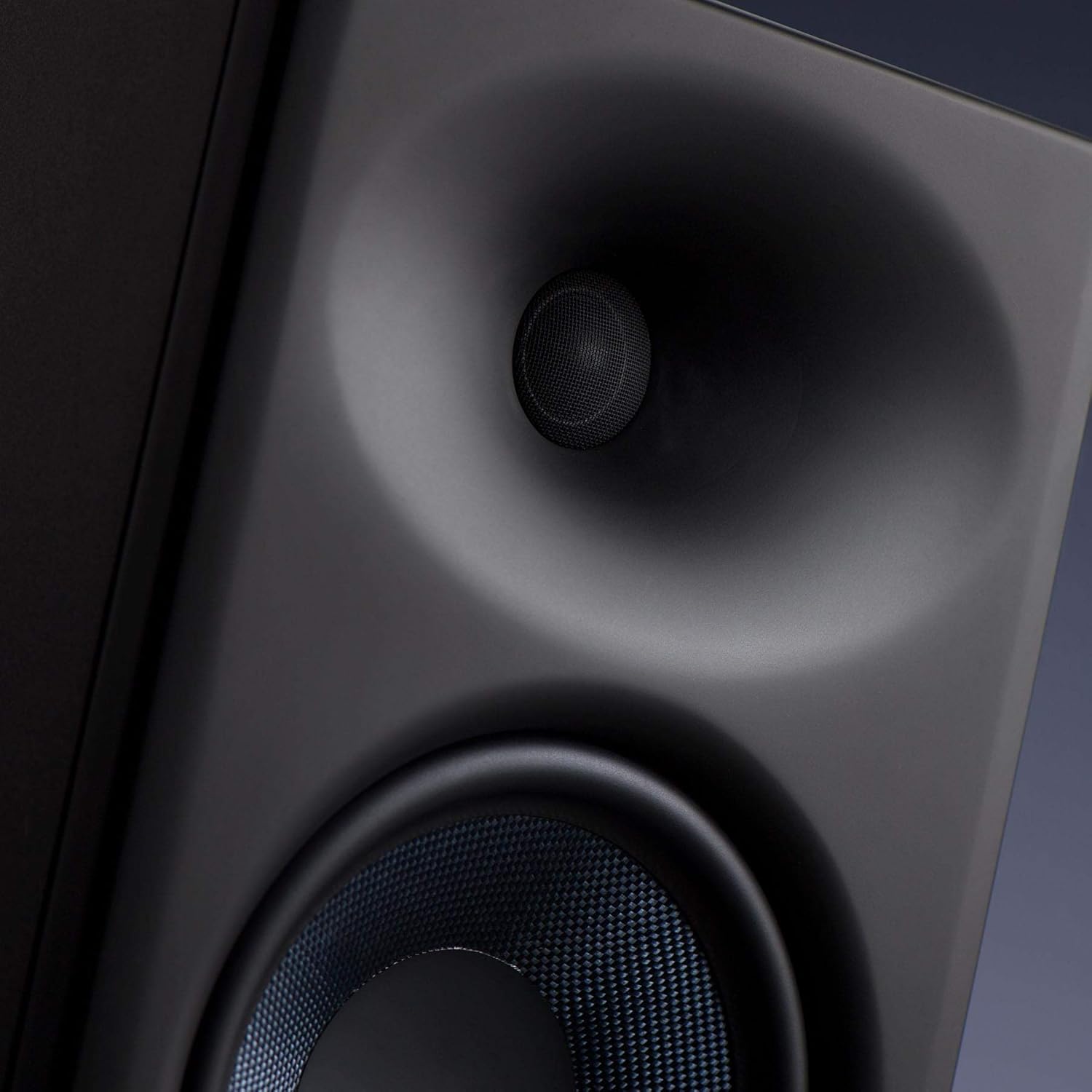 Close-up of the EBM waveguide and silk-dome tweeter on the PreSonus Eris E8 XT monitor.