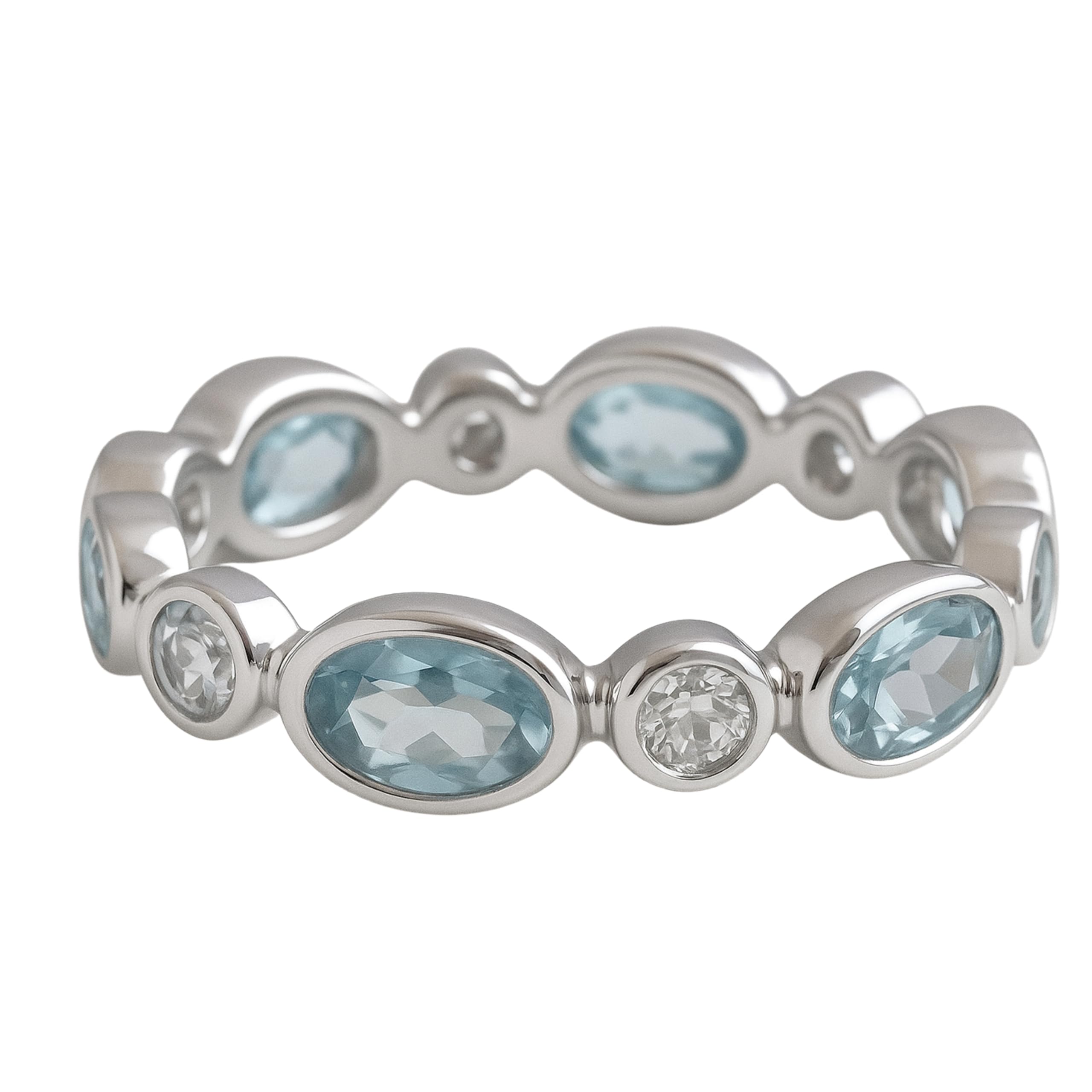 Anillo de plata de primera ley con topas azules y circonitas