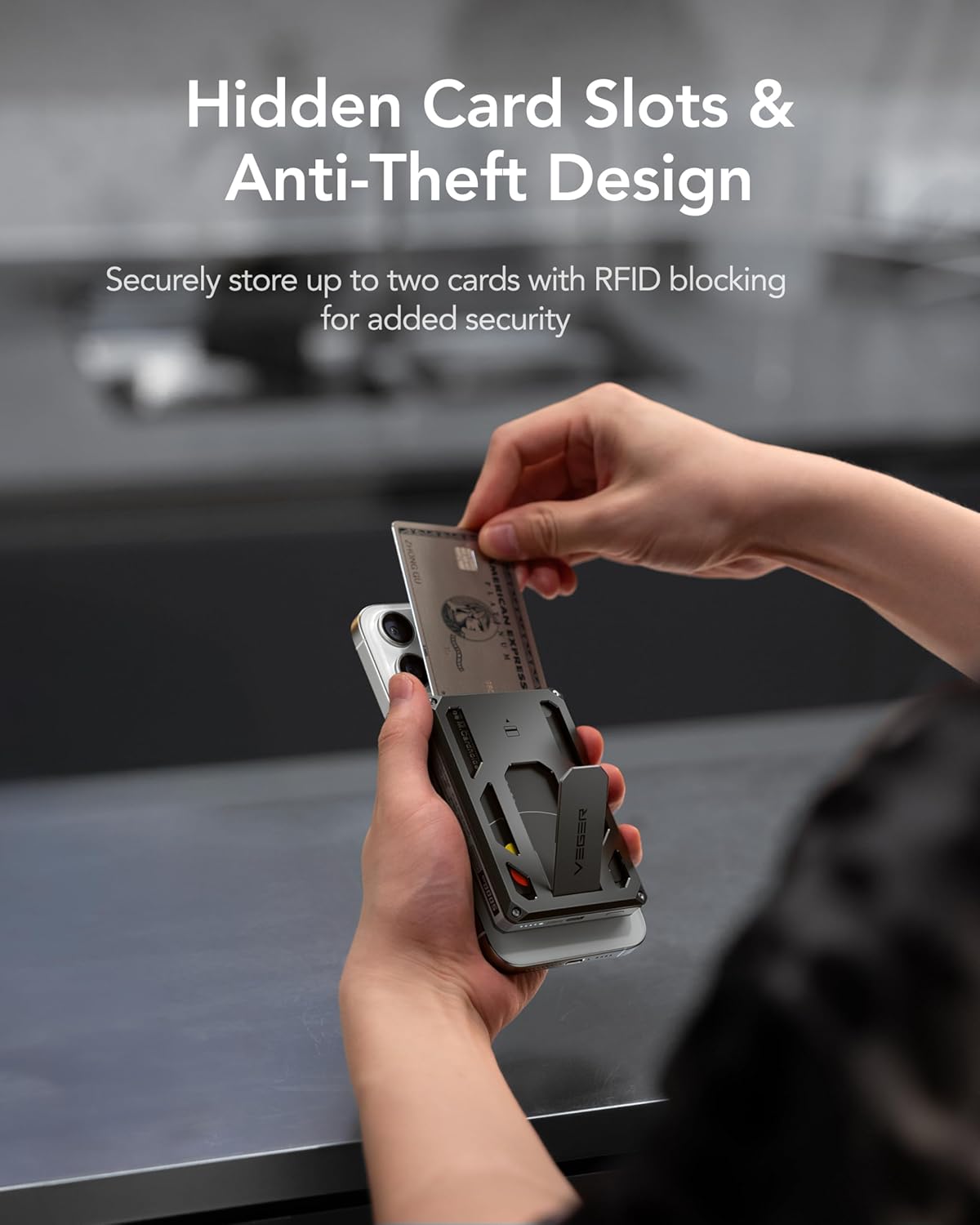 A hand inserting a credit card into the hidden card slot of the VEGER Magnetic Portable Charger, which is attached to an iPhone.