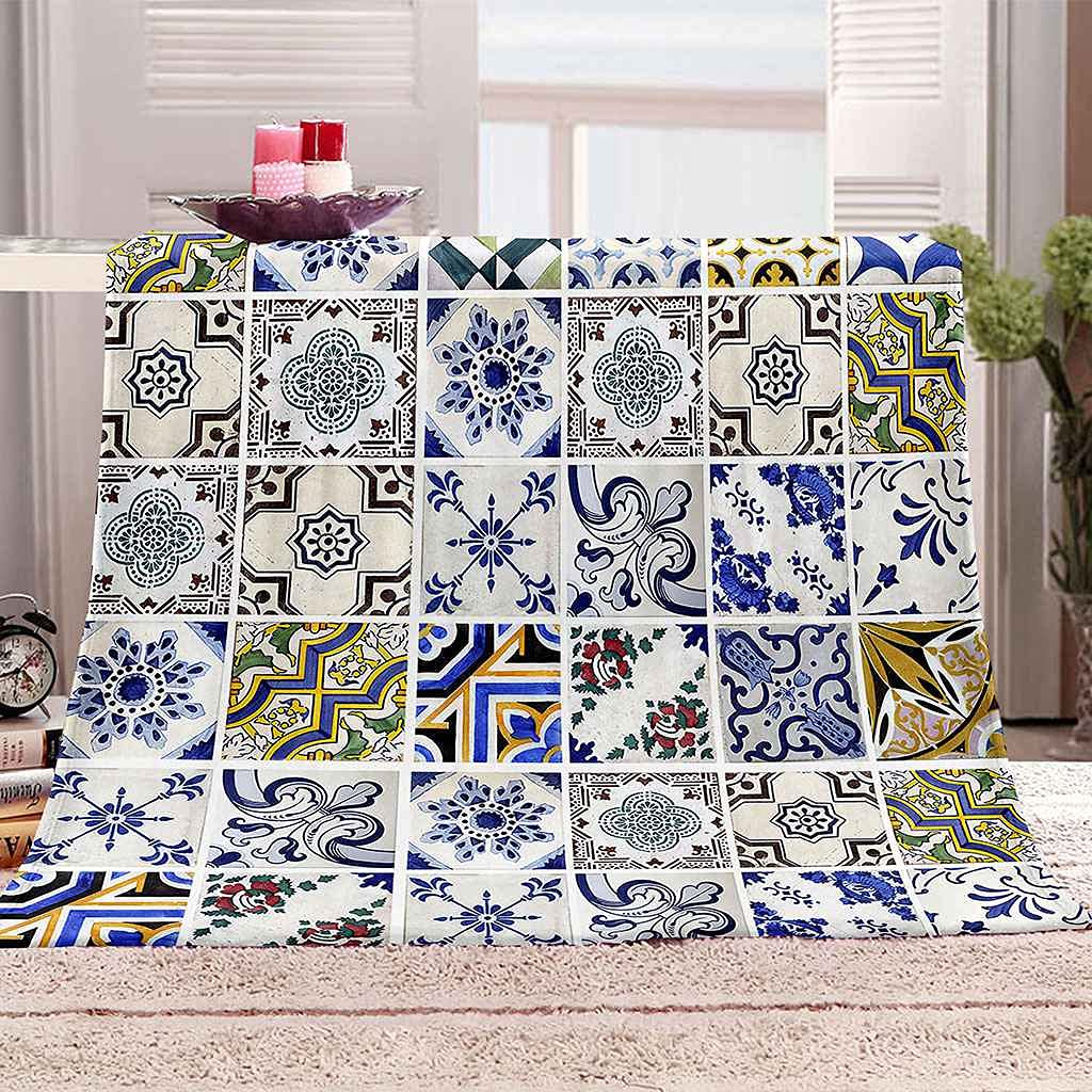 Couverture polaire fleurs bleues pour vos soirées cocooning au salon