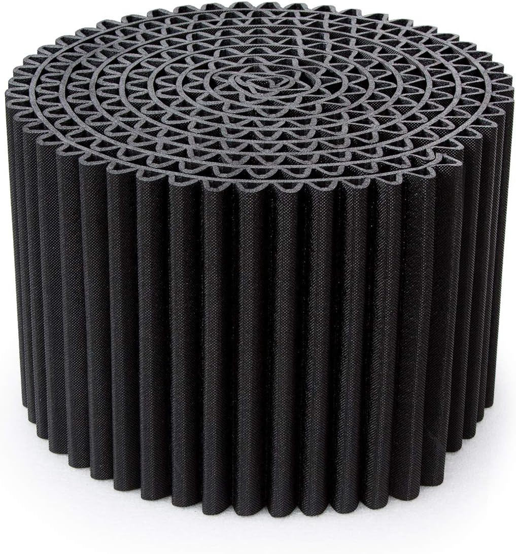 The Leggero Pouffe: more than just a simple seat; it's also a coffee table, night stand, footstool or ottoman (not the storage type). Perfect for outdoors, too — it's weatherproof. Diam. 55 cm, H. 36 cm. Colour: Black.