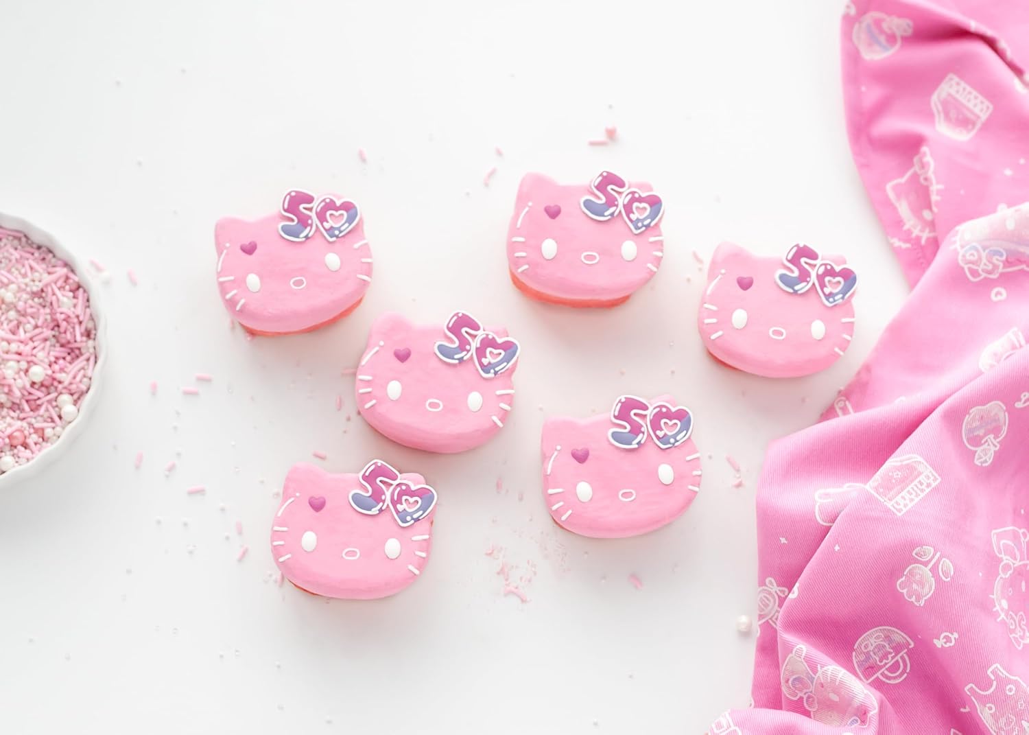 Handstand Kitchen Hello Kitty Commemorative 50th Anniversary Silicone Cupcake Mold Featuring Limited Edition Bow Detail & Pink Color