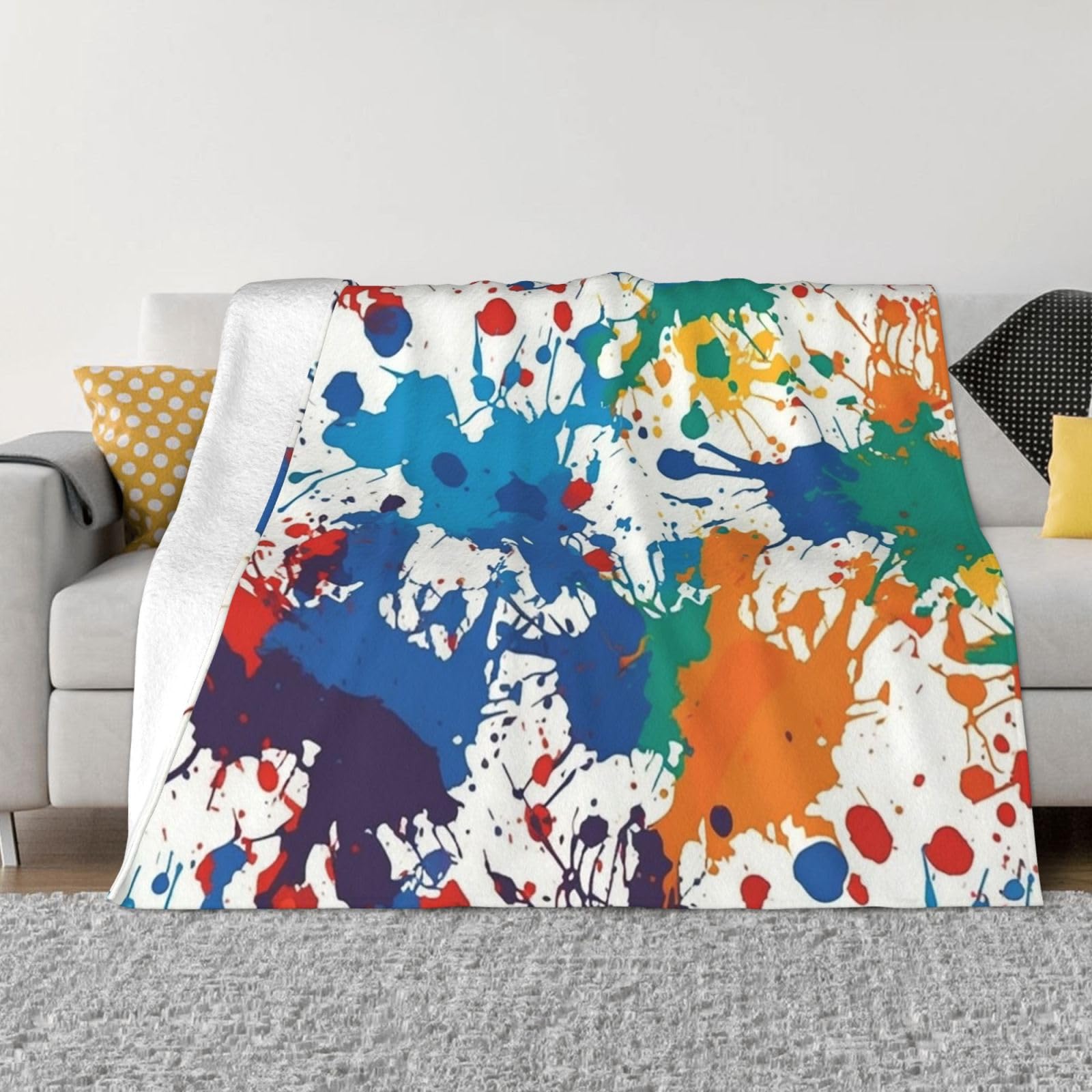 Couverture polaire éclaboussures de peinture pour cocooning sur le canapé et nuits douces