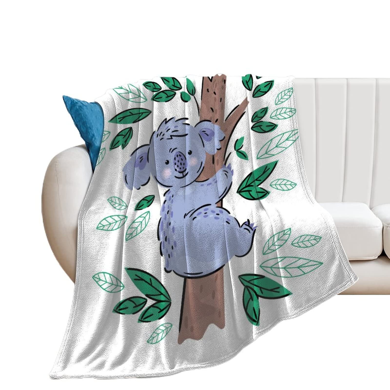Couverture polaire koala douce pour des soirées cocooning sur le canapé 130x150
