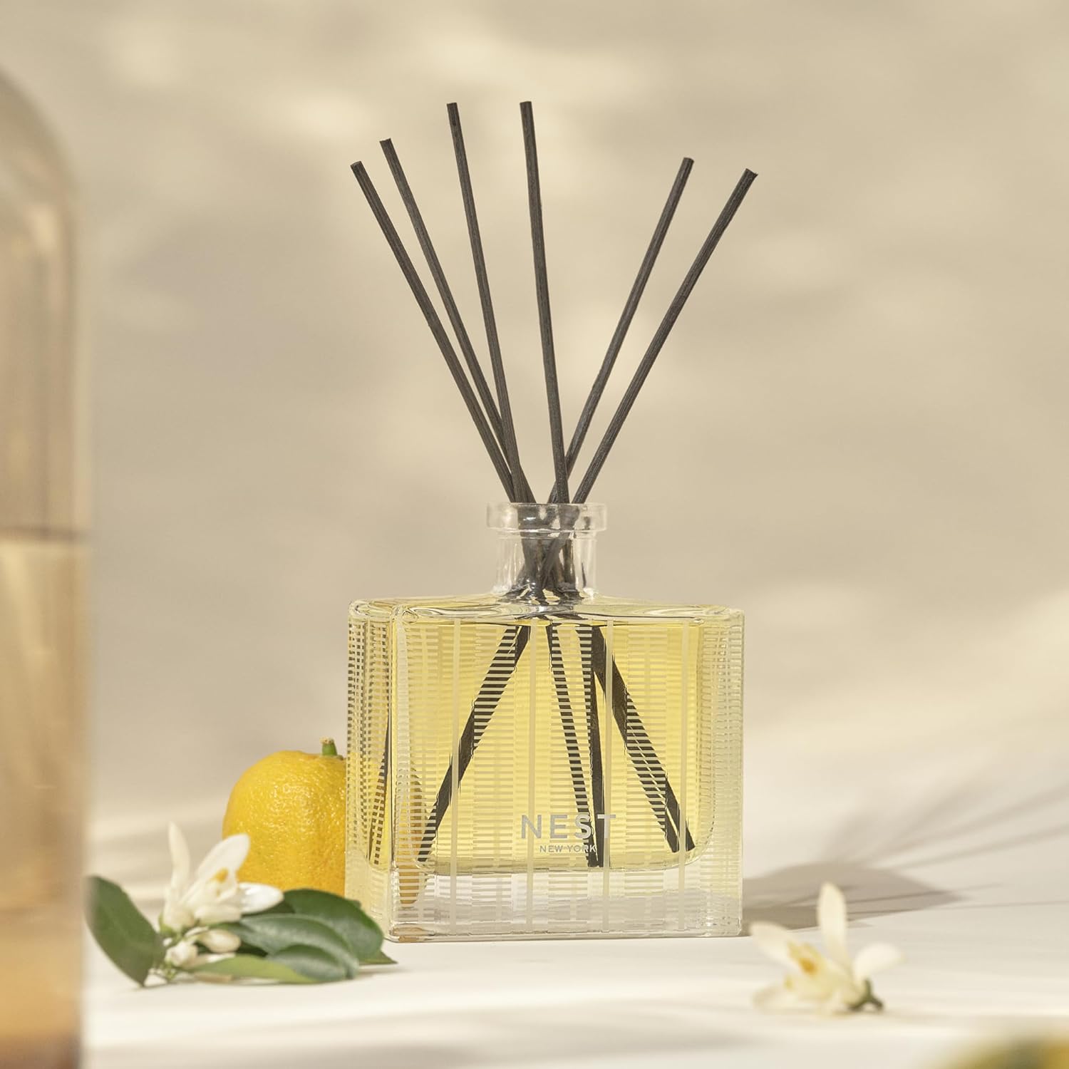 NEST New York Reed Diffuser, Sunlit Yuzu & Neroli - The Wellness Collection - 5.9 fl oz - Fragrance for Up to 90 Days - Reusable, Refillable Glass Holder - Includes 8 All-Natural Reed Sticks - Image 5