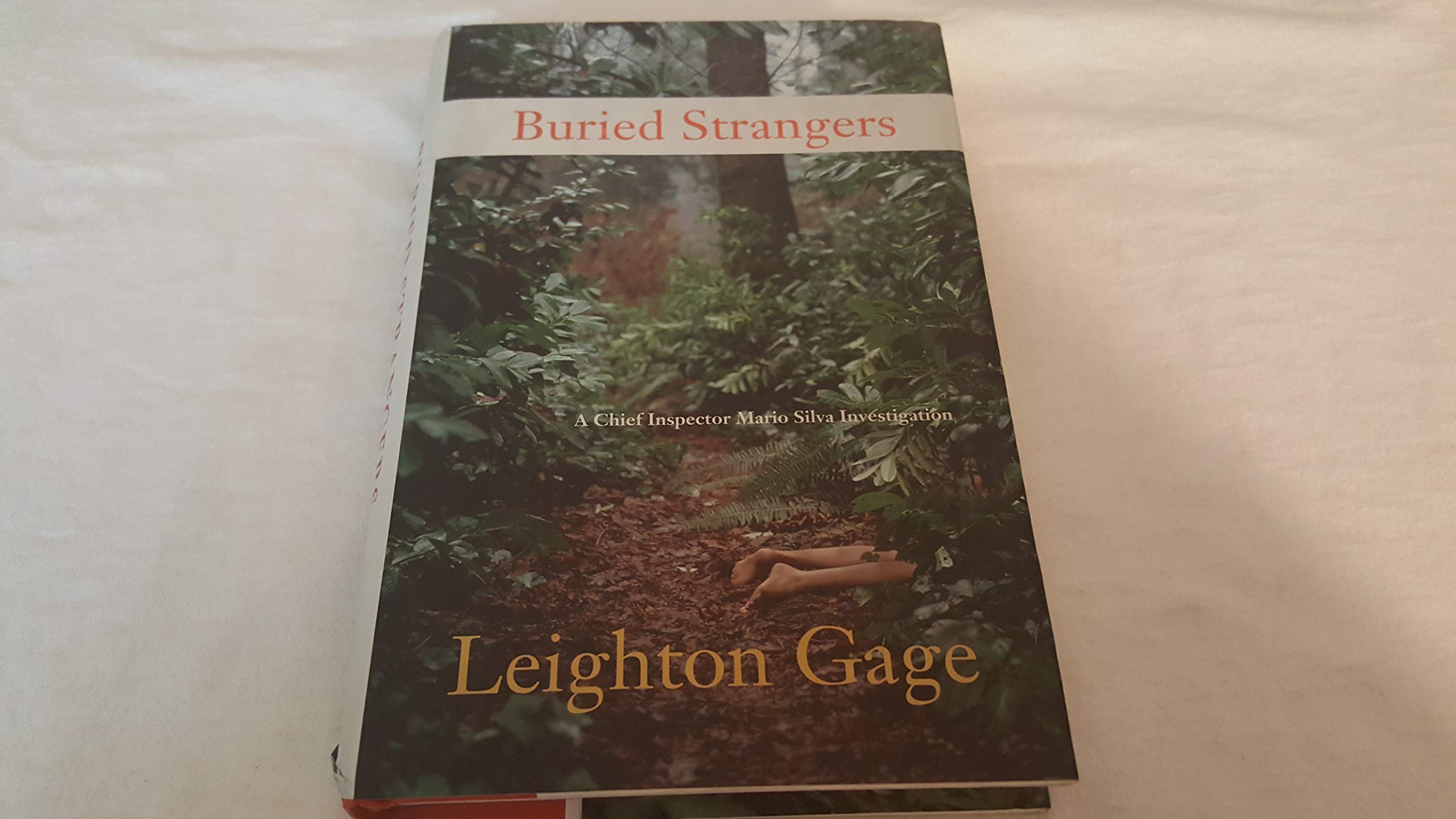 Buy Buried Strangers: A Chief Inspector Mario Silva Investigation — BookShops.in