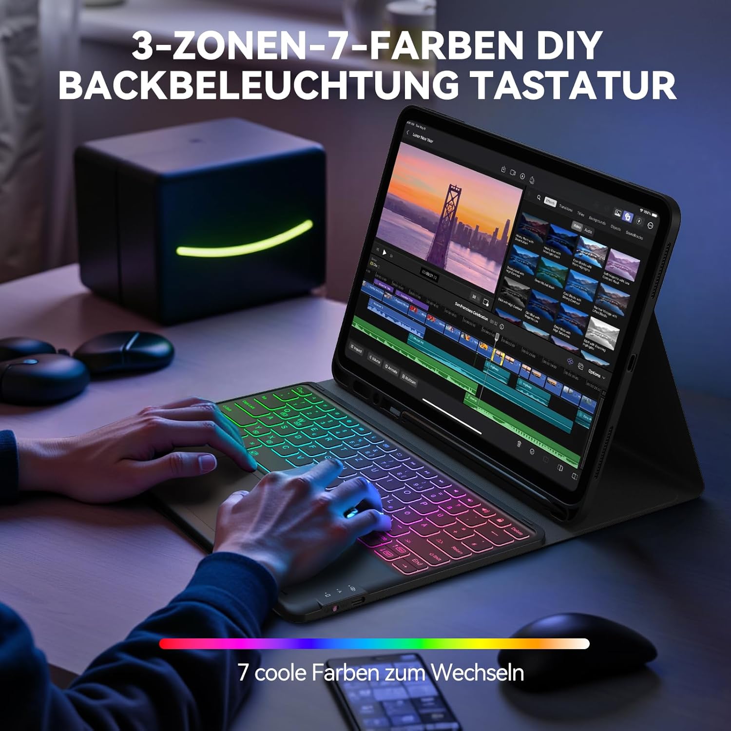 A user typing on the Earto keyboard case with the 7-color backlight illuminated.