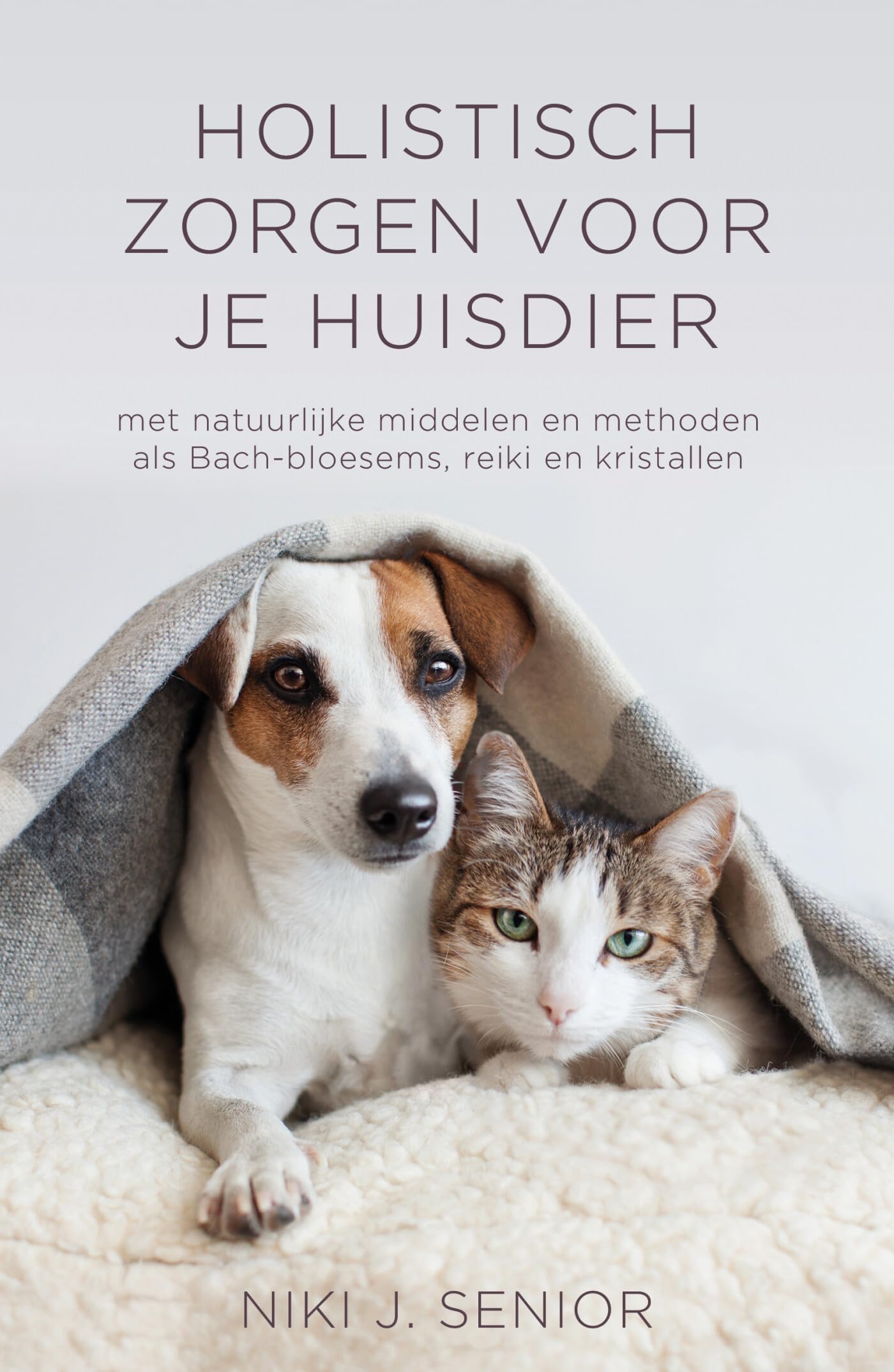 Holistisch zorgen voor je huisdier: met natuurlijke middelen en methoden als Bach-Bloesems, reiki en kristallen