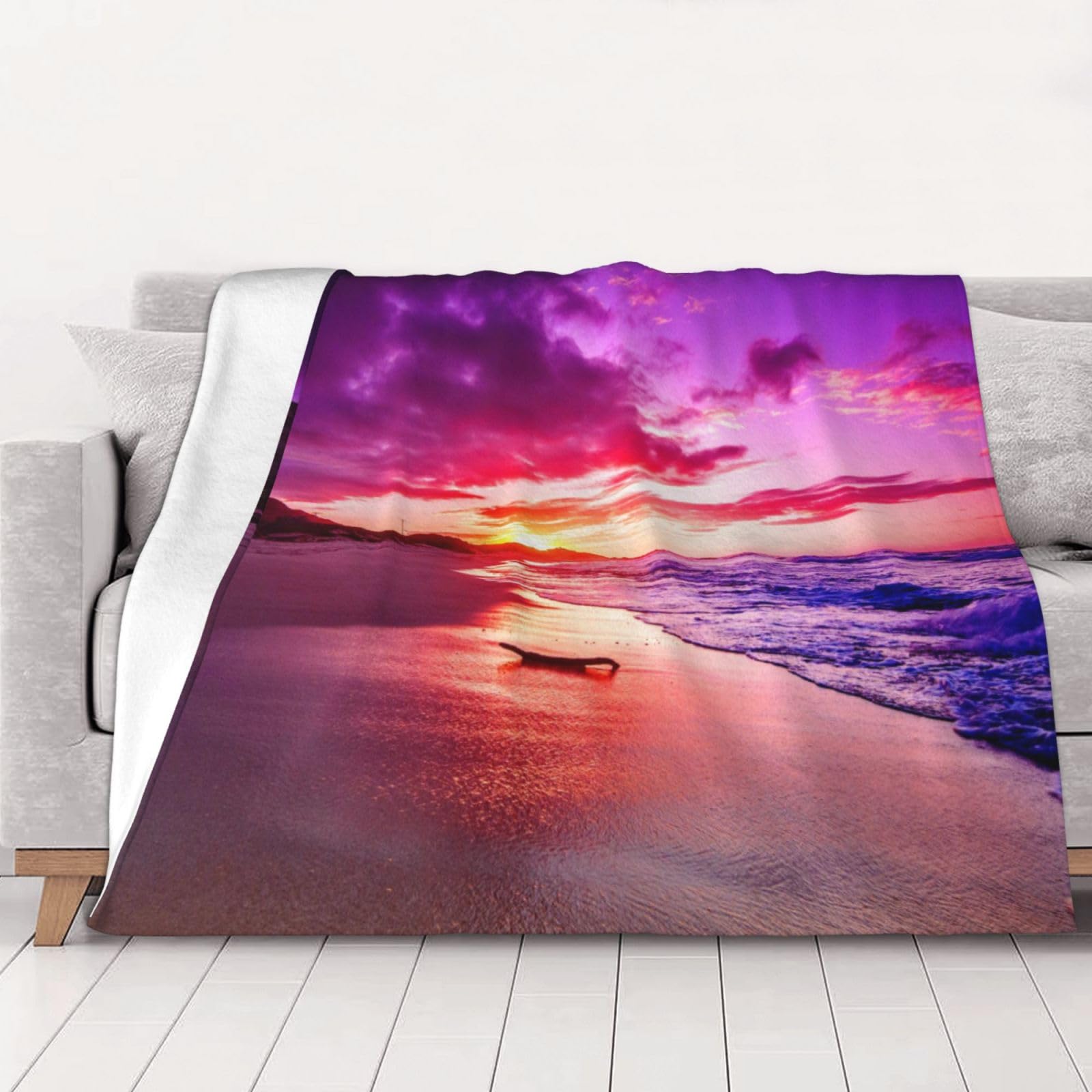 Plaid flanelle coucher de soleil contre le froid hivernal sur votre canapé