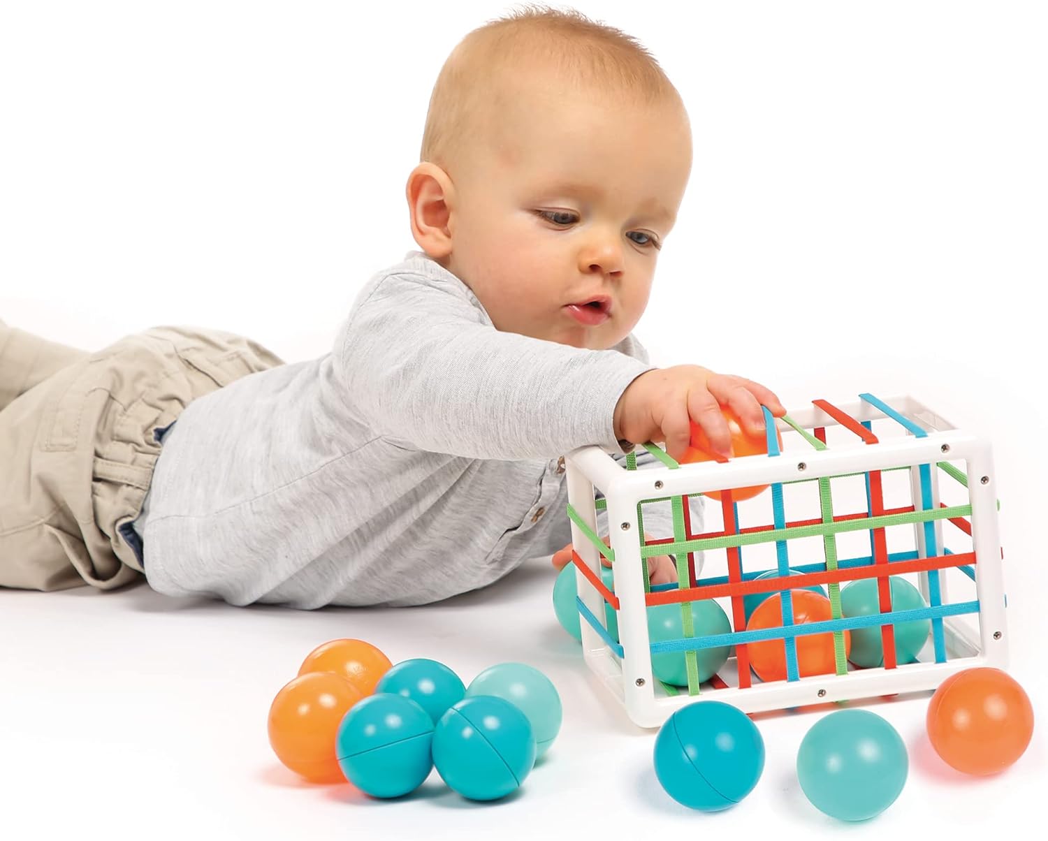 Ludi - Handling Cube - Early Learning Toys for Babies from 10 Months - Develops Thought, Fine Motor Skills, Touch & Discovery - 1 Elastic Cube + 12 Orange & Blue Balls with Funny Sound