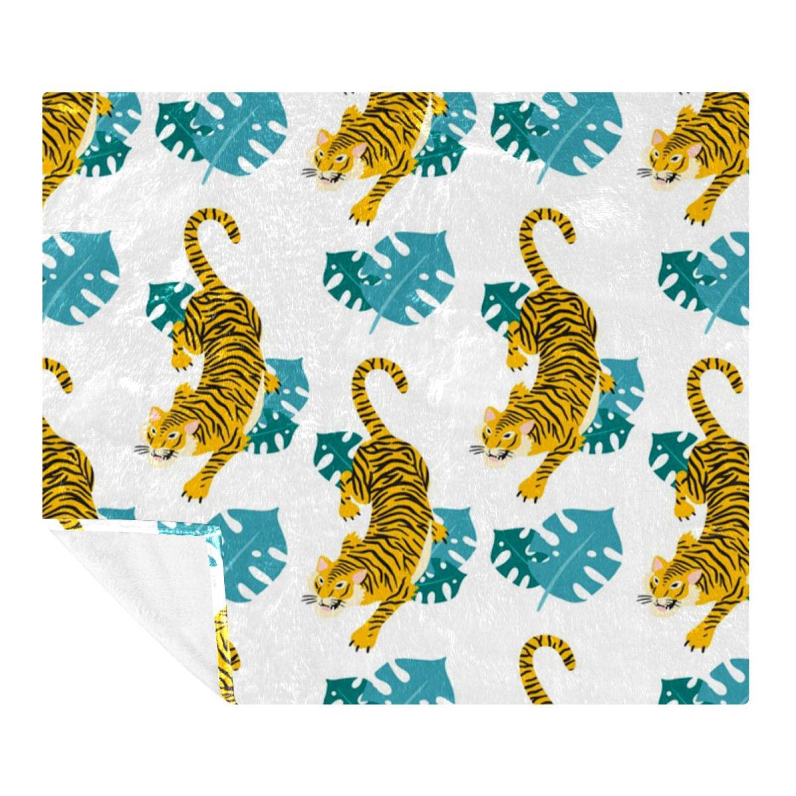 Plaid tigre polaire pour des soirées cocooning confortables sur le canapé