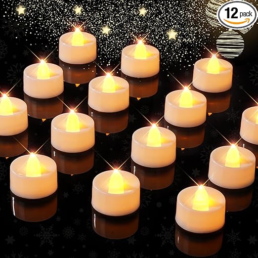 Battery operated tealight candles on a black table