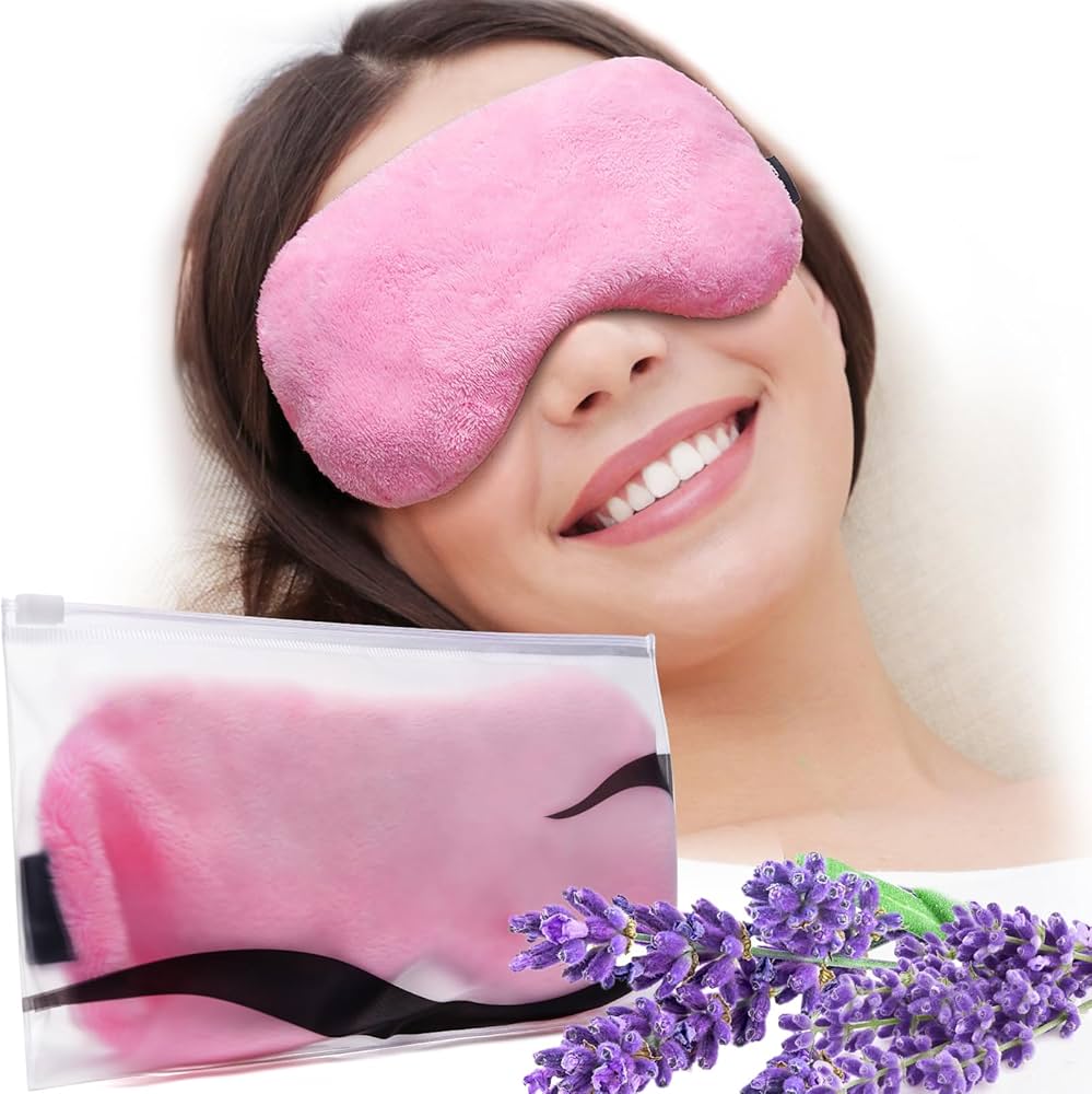 Soft fabric weighted eye mask resting on a bed