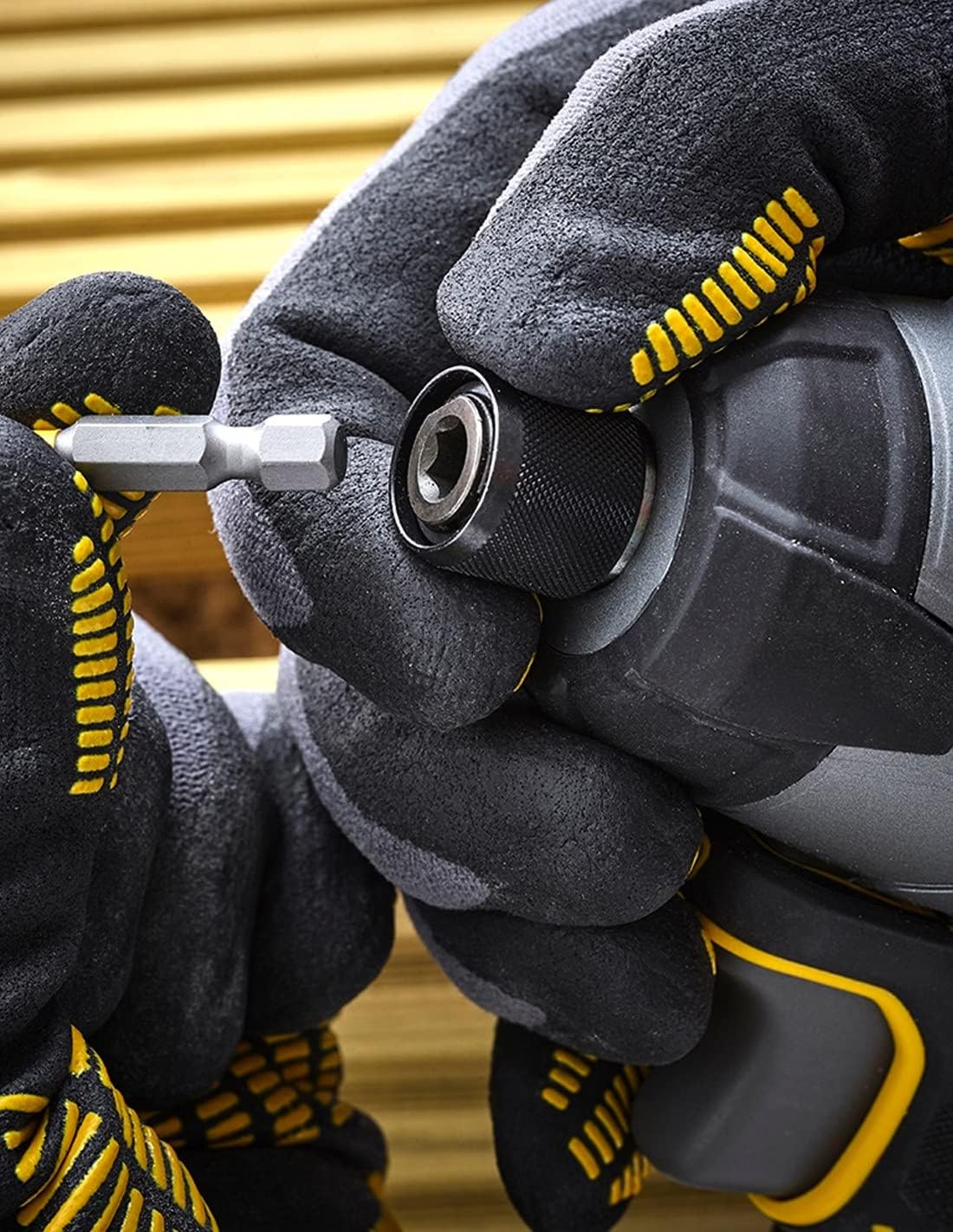 Hand inserting a hex bit into the impact driver chuck