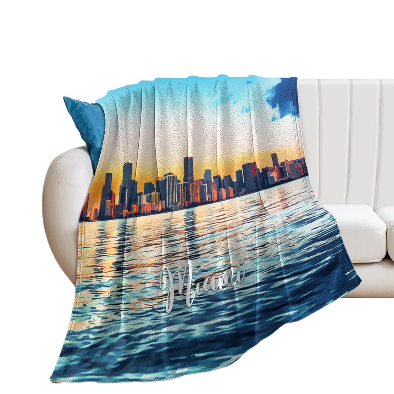 Couverture en flanelle Miami chaude pour ne plus jamais avoir froid au canapé