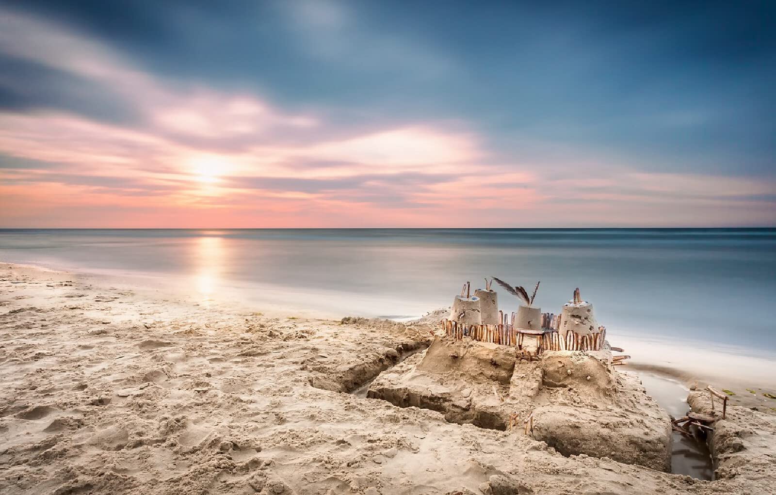 twarde puzzle dla dorosłych 1000 elementów Plaża miejska zamek morski 75x50cm