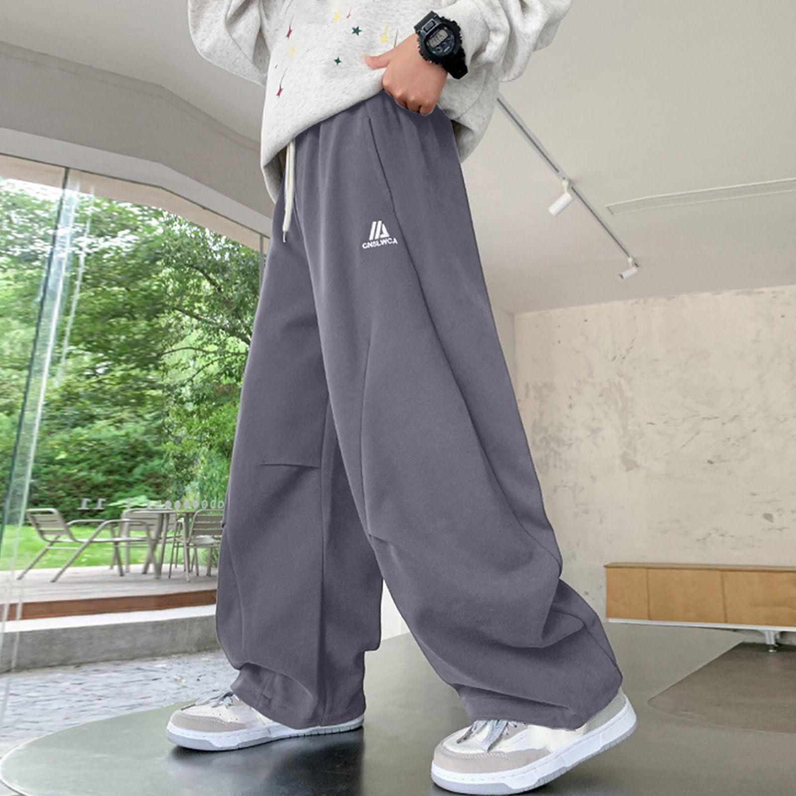Pantalones holgados para niños Pantalones de deporte resistentes Tejido fresco y ventilado Puños elásticos en los bajos Resistentes y duraderos Diseño clásico atemporal Diseño funcional práctico