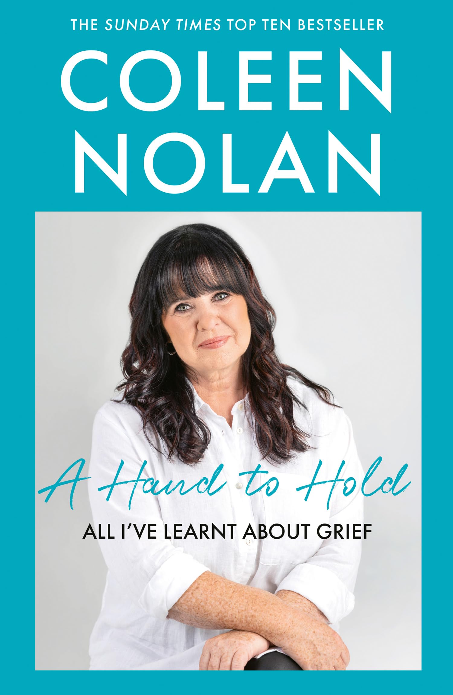 A Hand to Hold: The Sunday Times Top Ten Bestseller. A compassionate and supportive memoir on coming to terms with loss from Loose Women’s Coleen Nolan
