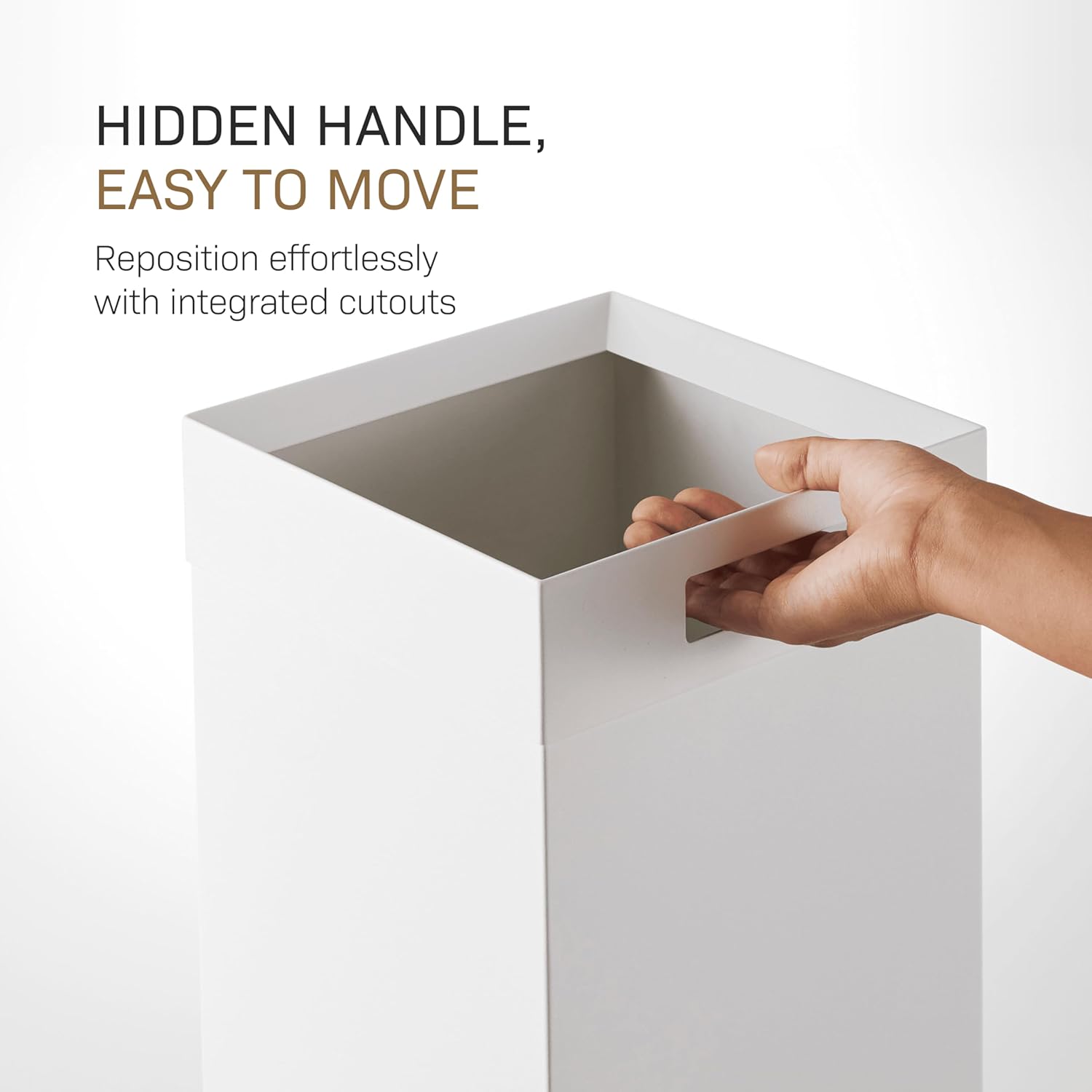 YAMAZAKI Home Tall Slim Trash Can with hand holding the handle