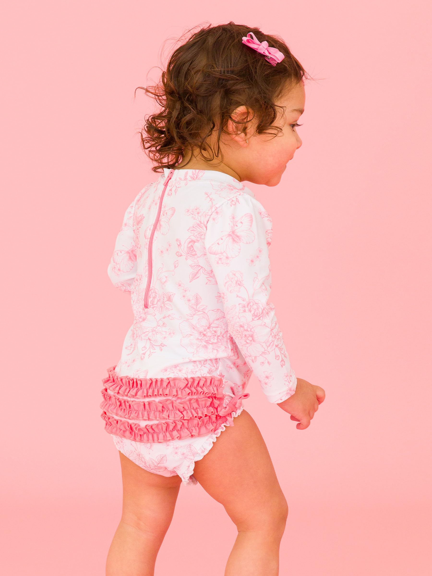RuffleButts Costume da Bagno Intero A Maniche Lunghe con Stampa Floreale, Protezione Solare UPF 50 per Neonate, con Cerniera - Periwinkle Butterfly Garden, 3-6 Mesi