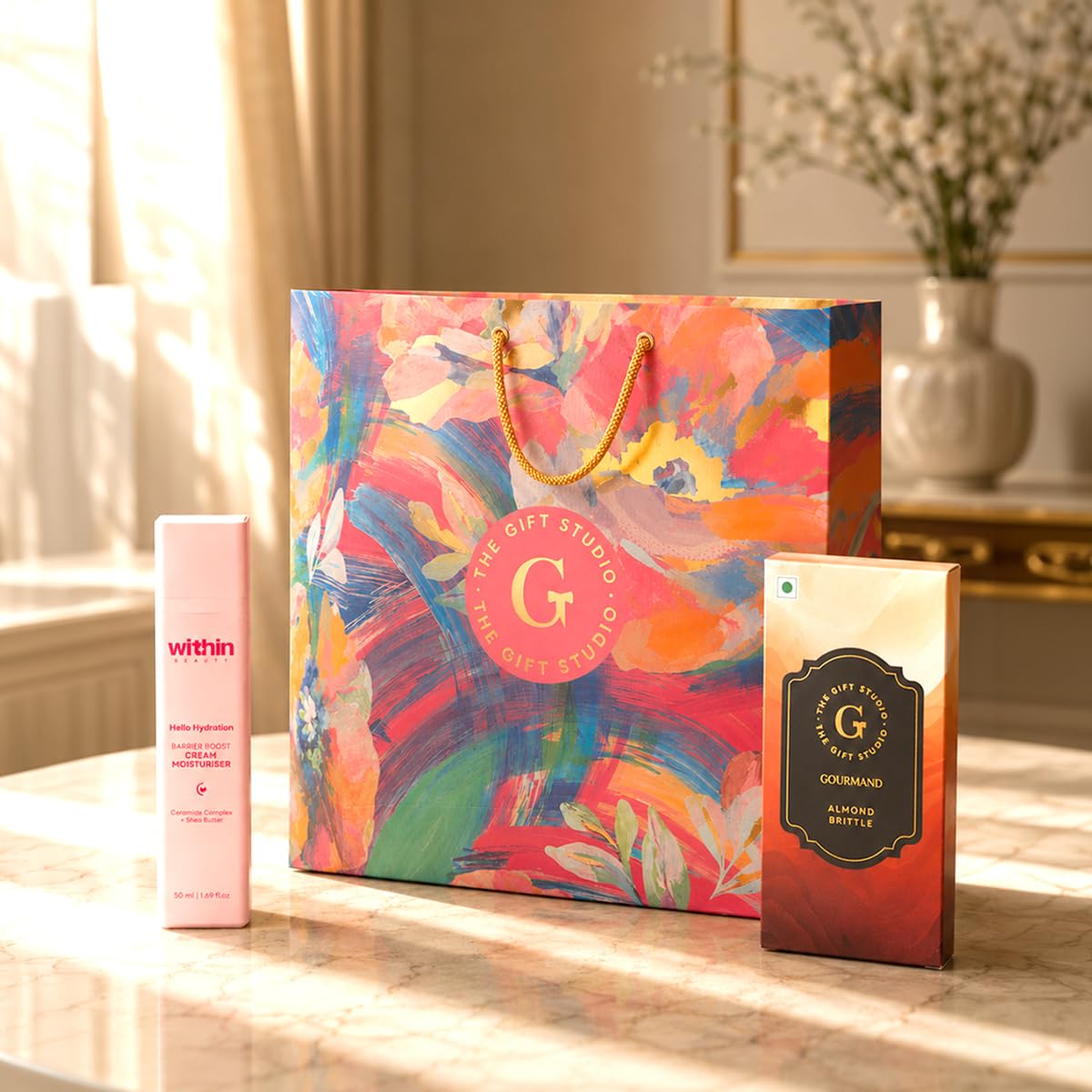 THE GIFT STUDIO.COM | Glow Beauty Gift Set for Sister | Hello Hydration Cream, Almond Brittle & Floral Gift Bag | Self-Care Gift Hamper | Raksha Bandhan Gift-image-17