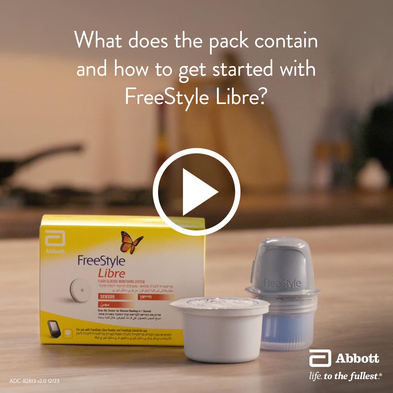 Components of the FreeStyle Libre Sensor kit: sensor, applicator, and box.