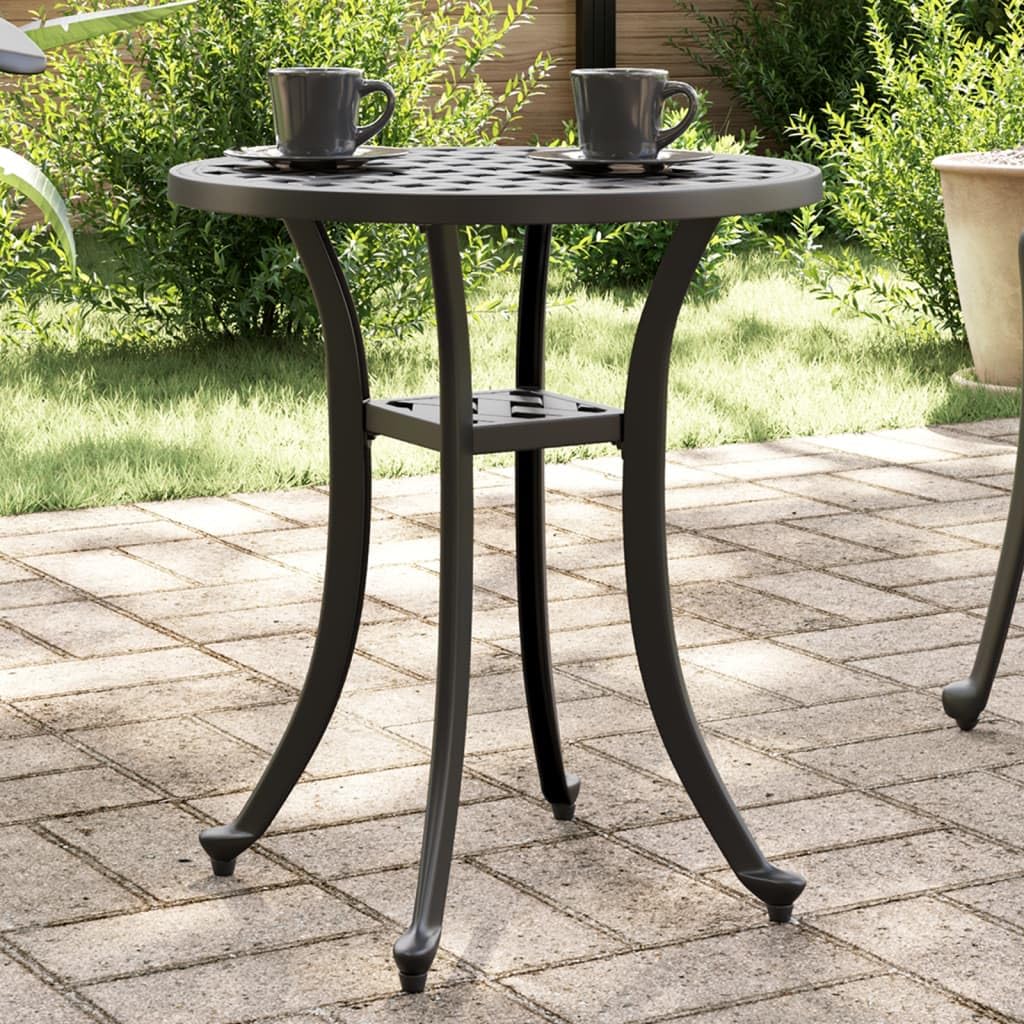 Mesa de jardín redonda para desayunos en el balcón