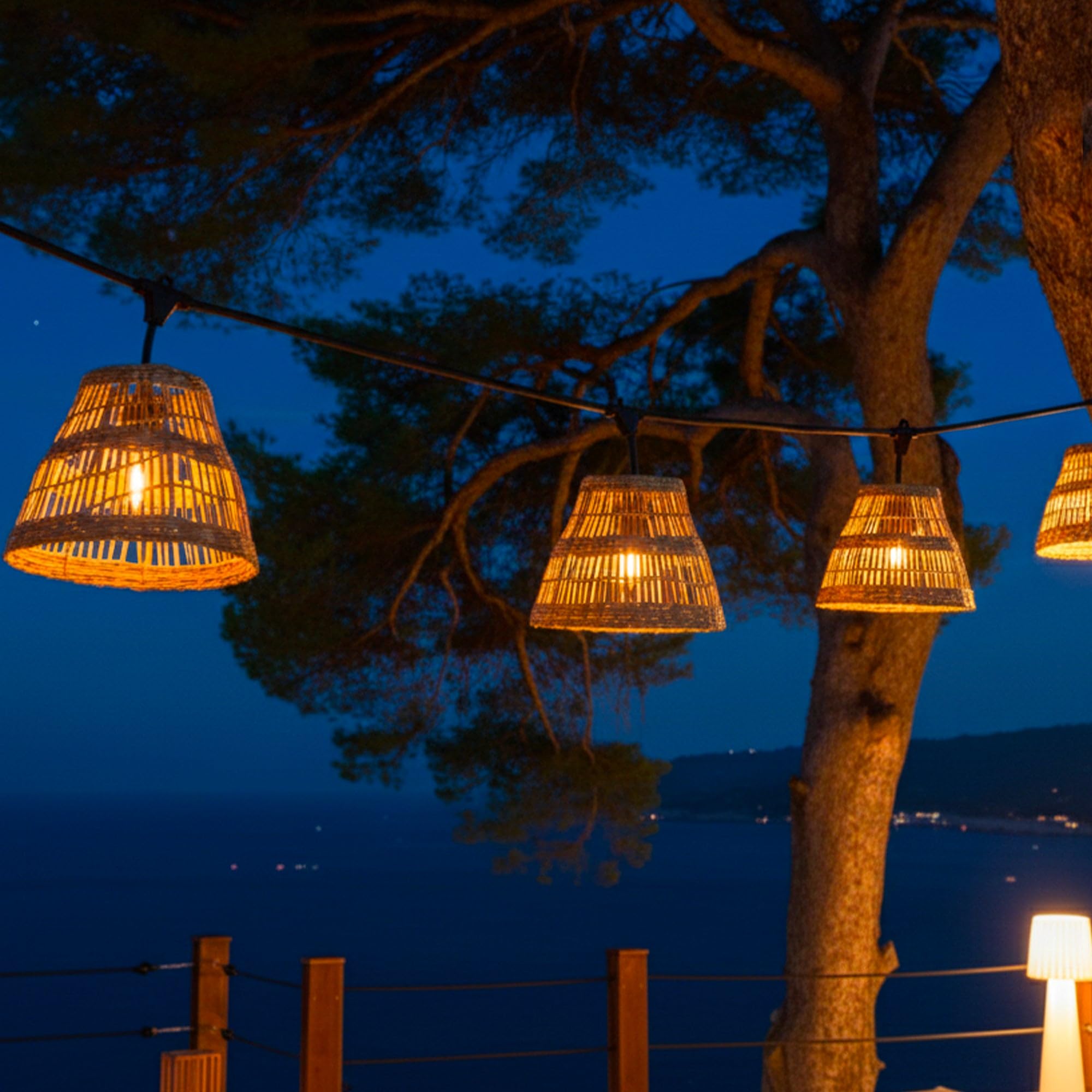 Lumisky Lichterkette mit Lampenschirm aus Seegras im Boho-Stil, 7-flammig, E27-Fassung, warmweiß, 6 m
