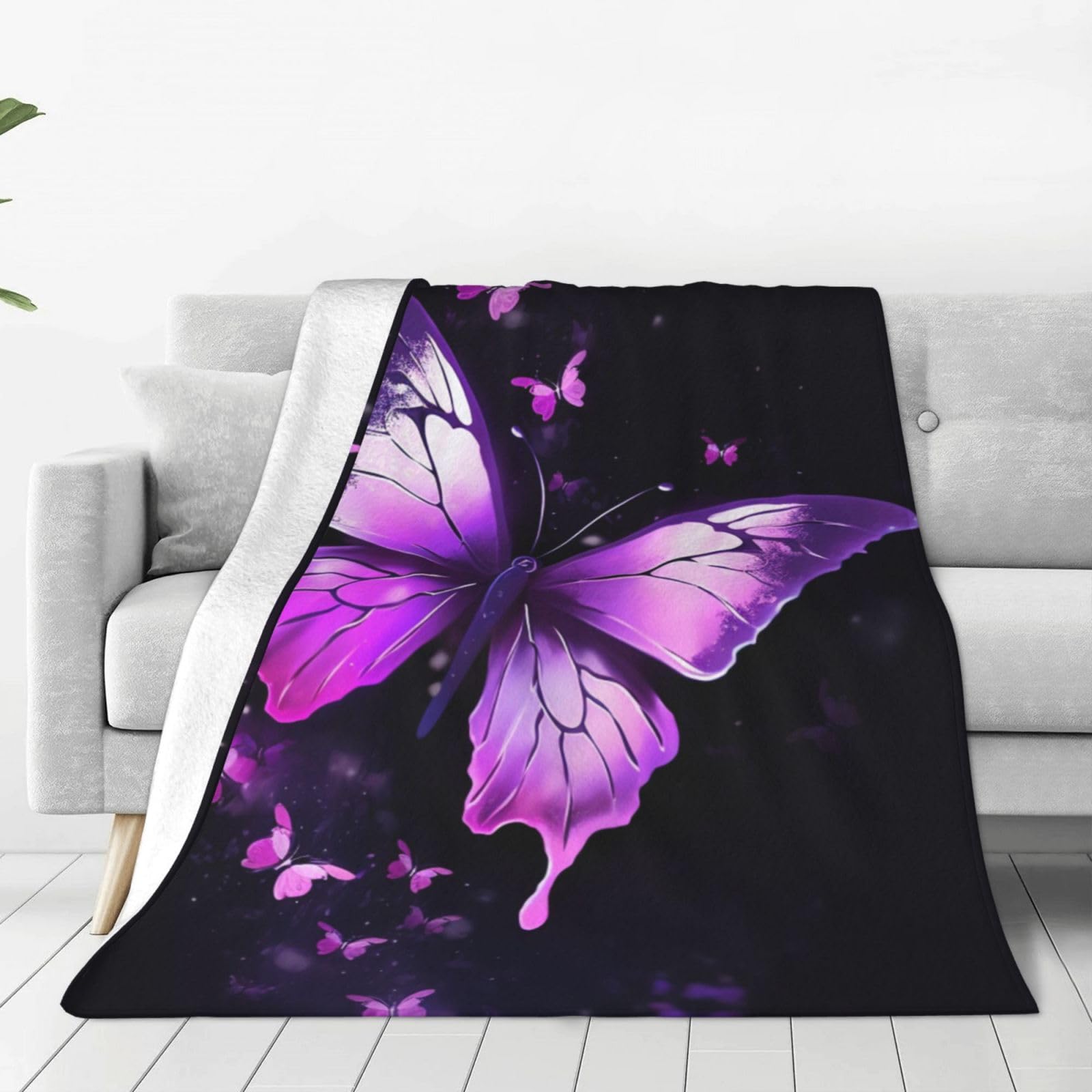Couverture polaire papillon violet pour des instants de douceur et réconfort