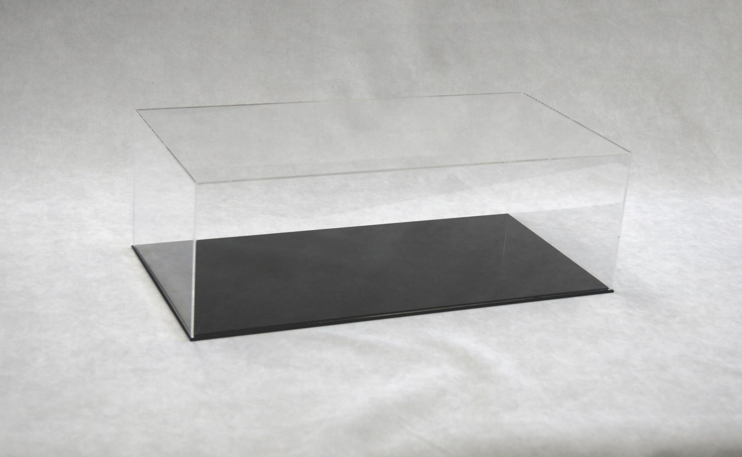 ORUS - Teca con base nera 60 x 30 x 20h cm.