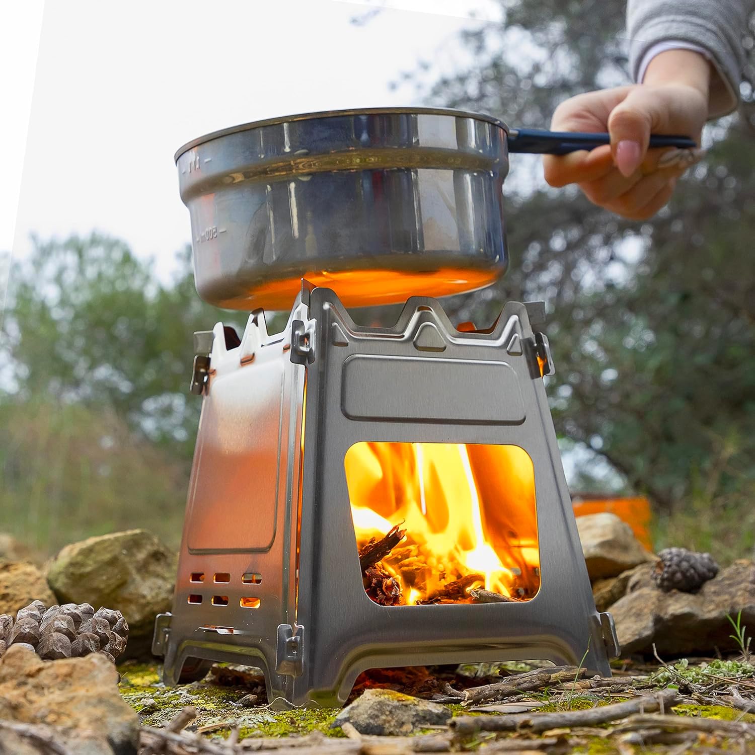 Avilia Hornillo de camping plegable – Cocina de viaje de acero con bolsa para transporte, portátil, ideal para picnics y excursiones, de acero inoxidable, diámetro 15,5 x 18 cm
