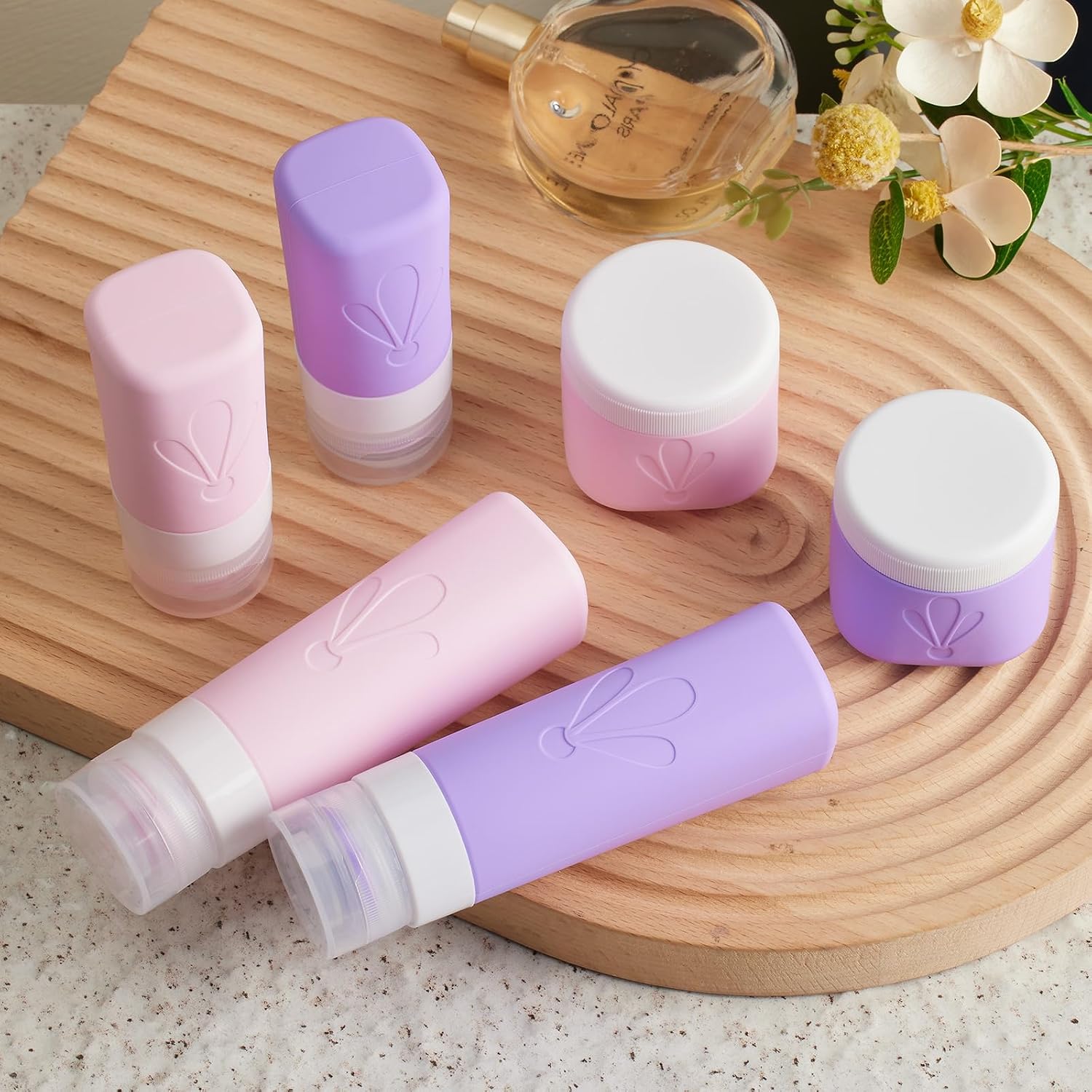 INSFIT travel bottles for toiletries 6 Pack, Leak proof Travel Size Toiletries Containers with toiletry bag, Squeezable Silicone Bottles & Cream Jars, Travel Essentials BPA-Free set for Shampoo