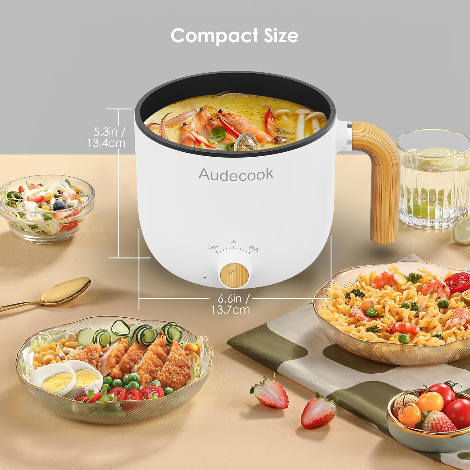 Audecook 1.5L Portable Non-Stick Mini Multicooker with dimensions indicating its compact size: 5.3 inches (13.4 cm) height and 6.6 inches (13.7 cm) width.