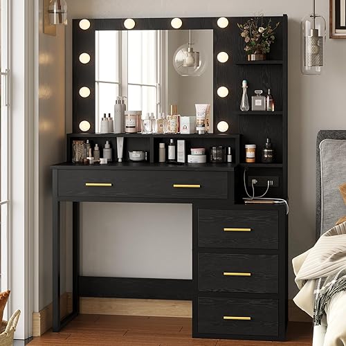 Tiptiper Tocador de maquillaje con luces, escritorio negro con espejo y 3 modos de iluminación, mesa de tocador con puertos USB y tomacorrientes,