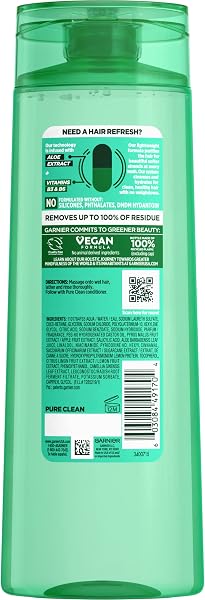 A clear view of the Garnier Fructis Pure Clean Purifying Shampoo bottle, highlighting its 12.5 Fl Oz size and key feature callouts.
